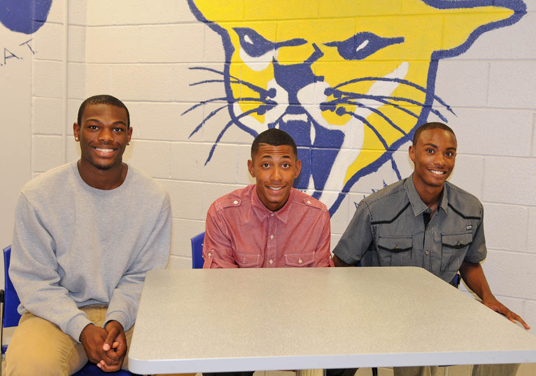Click to enlarge,  Central Carolina Community College Cougars' Men's Basketball has signed some exciting freshmen talent for the upcoming season, including (pictured, from left) guards Brandon Opara, of Concord, Norman Aiken, of Spindale, and Nick Scholfield, of Statesville. Also recently signed are guards Deinzel Greene, of Concord, Deion Gilchrist, of St. Paul's, and Josh Lee, of Sanford; as well as forwards Kalon Buchanan, of Hopewell, and Rickey Porter, of Charlotte. Head men's basketball coach Doug Connor is looking forward to a good season. 2013-14 is Connor's eighth year in that position. During that time, he has coached more than 20 players that have gone on to play basketball at 18 different NCAA Division I, II, and III colleges and universities. CCCC is a member of the National Junior College Athletic Association Division III's Region X, which includes North and South Carolina, Virginia and West Virginia. For more about sports at CCCC, visit  www.cccc.edu/sports . 