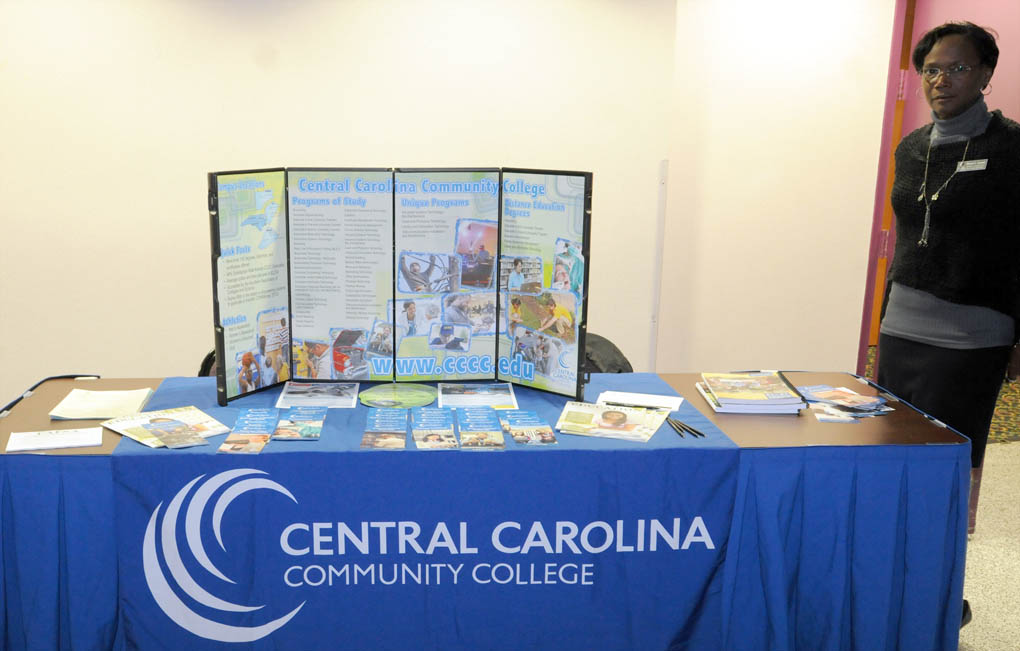 Click to enlarge,  Wrenn L. Crowe, Central Carolina Community College Student Outreach and Recruiting Specialist, Division of Student Learning, stands ready to greet veterans during the Veterans College Fair on Friday, Nov. 14, at the Dennis A. Wicker Civic Center in Sanford. For more information on the CCCC Veterans Upward Bound program, call 919-718-7463, email veteransub@cccc.edu, or visit the program's website www.cccc.edu/vub/. 