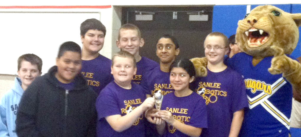 Click to enlarge,  The SanLee Middle School robotics team won a trophy for Teamwork at the middle school robotics competition held Nov. 15 at Central Carolina Community College. 