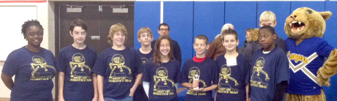 Click to enlarge,  The West Lee Middle School robotics team won a trophy for Best Robot Performance at the middle school robotics competition held Nov. 15 at Central Carolina Community College. 