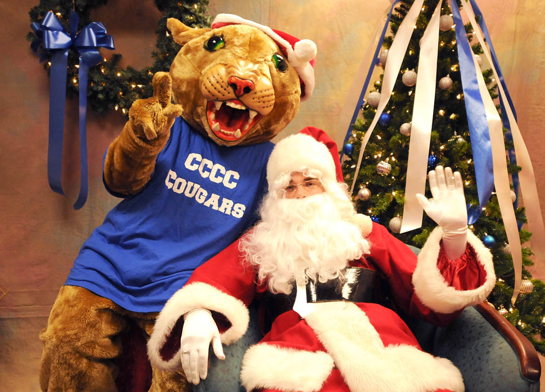Click to enlarge,  Central Carolina Community College mascot Charlee Cougar and Santa Claus welcome guests for the CCCC Foundation's Christmas Tree Lighting event on Dec. 2 at the college's Siler City Center. 