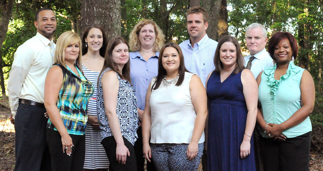 Click to enlarge,  Central Carolina Works Career and College Advisors include, left to right: front row, Tracy Autry, Kimberly Brzozowski, April Hammonds, Lara Abels, and Latoya Parker; back row, Elvin James, Kelli Hammond, Virginia Brown, Foster Cates, and Steve Heesacker. 