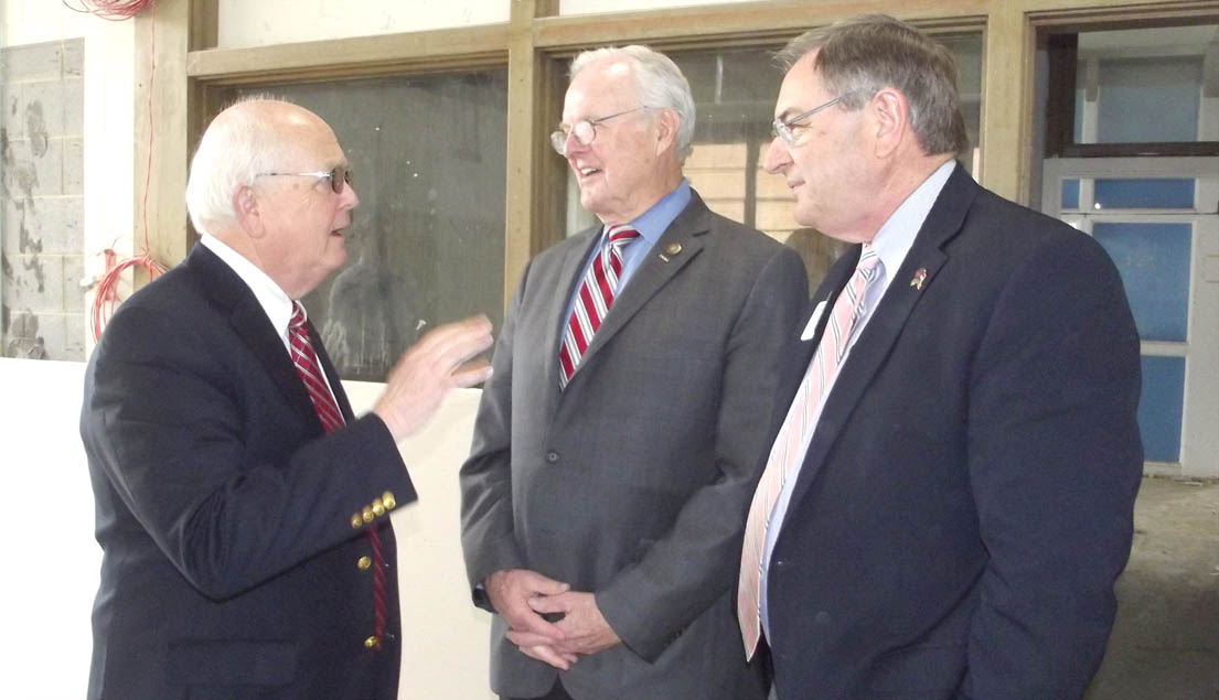 Click to enlarge,  Bill Tyson, Central Carolina Community College Harnett County Provost, visits with State Sen. Ronald Rabin and Harnett County Commissioners Chairman Jim Burgin during a tour of the CCCC Dunn Center facilities.  