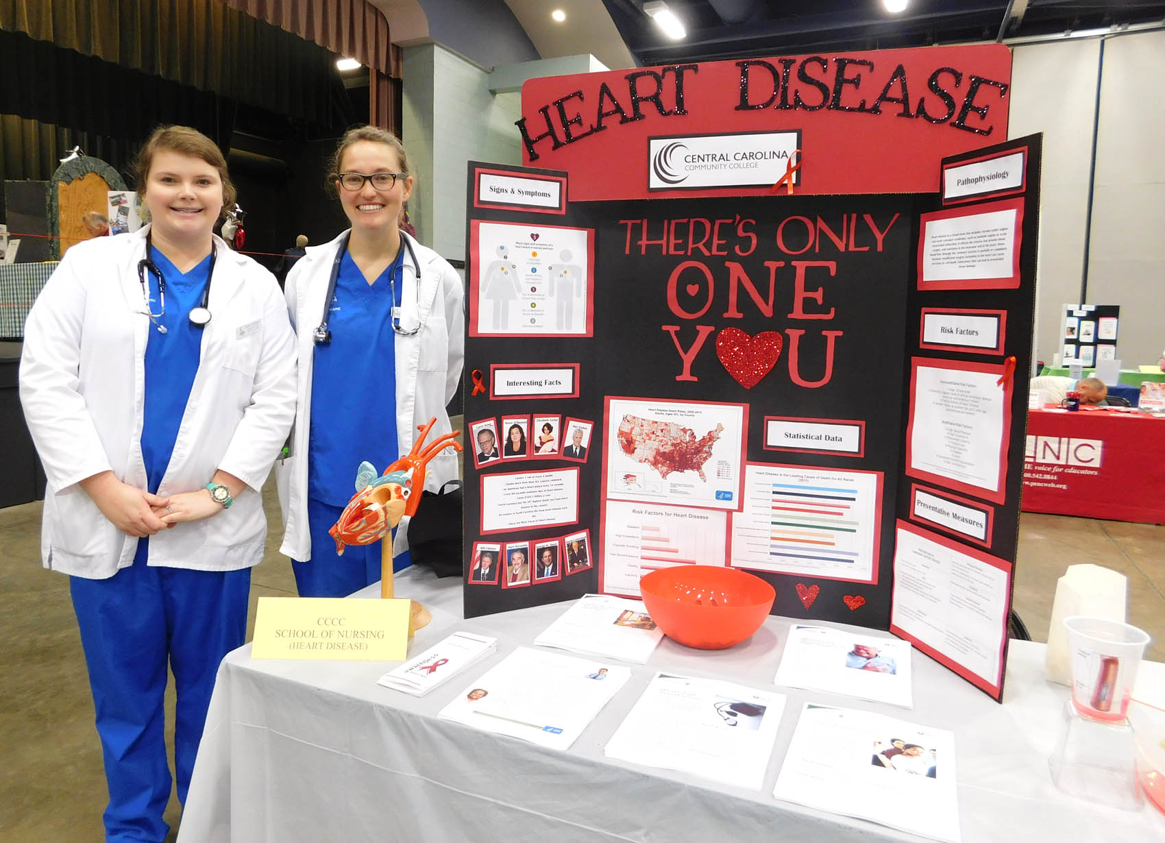 Click to enlarge,  Central Carolina Community College School of Nursing students Emily Turlington and Sophie Schlegel were pictured during the Lee County Schools/CCCC Family Health &amp; Benefits Fair on Tuesday, Nov. 3, at the Dennis A. Wicker Civic Center. 