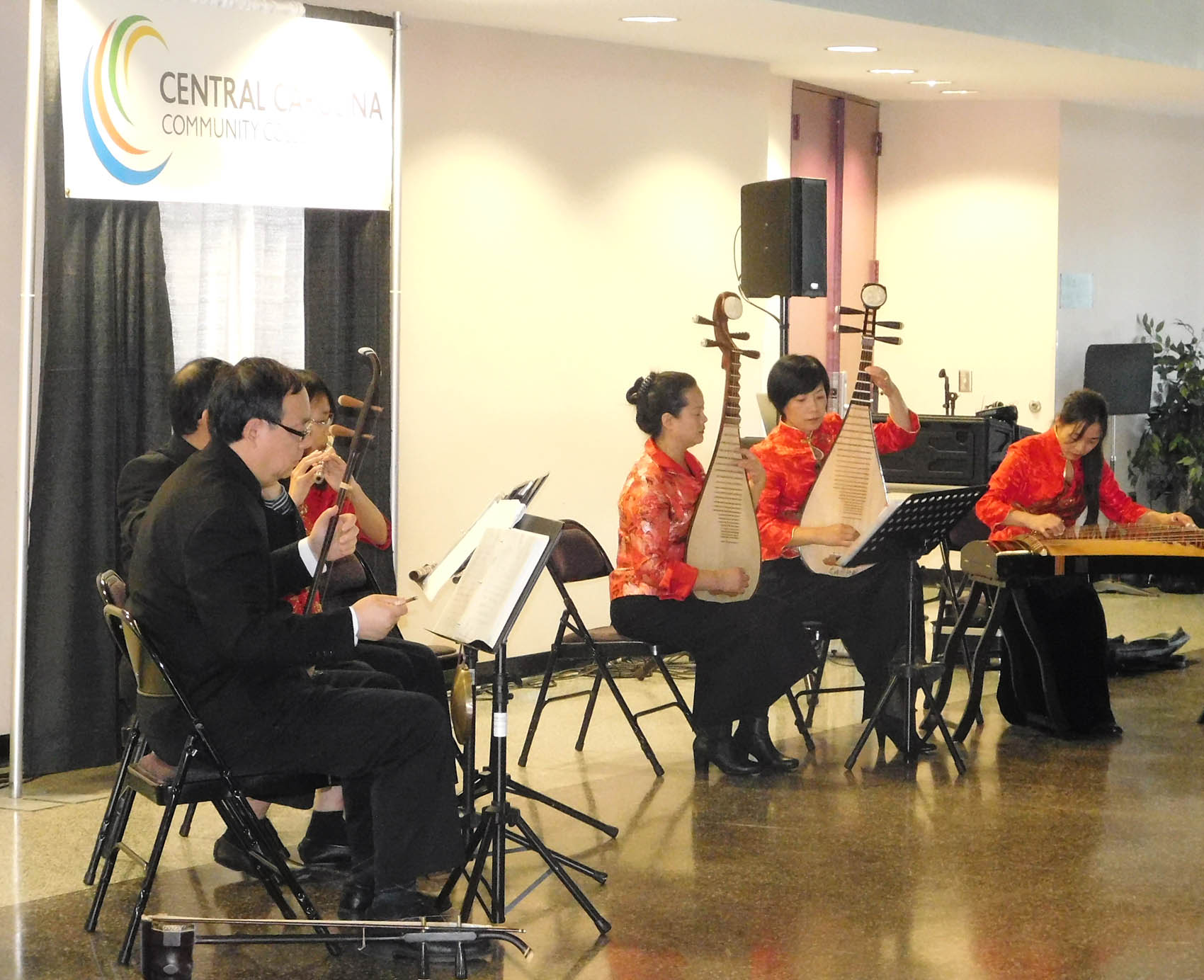 Click to enlarge,  Musicians from the NC-RTP Chinese Music Ensemble performed traditional songs as part of the Chinese Art Exhibition held Sunday, Nov. 15, at the Dennis Wicker Civic Center. 