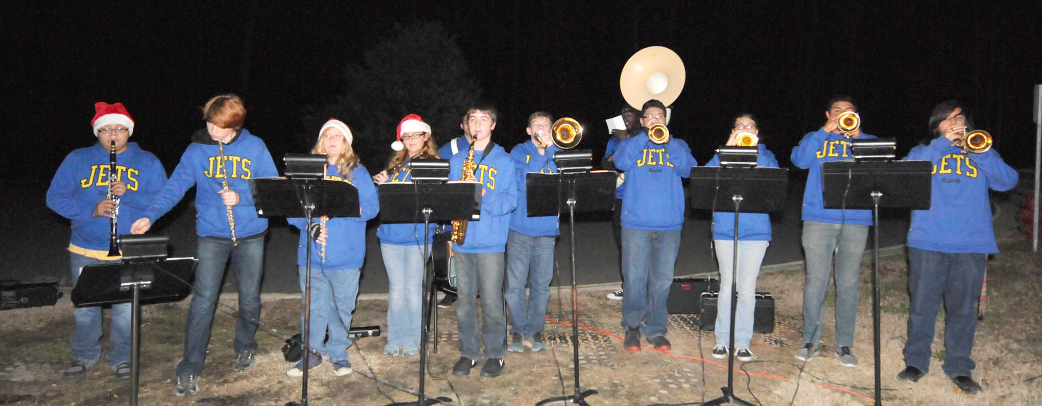 Click to enlarge,  The Jordan-Matthews High School band entertained guests at the Central Carolina Community College Christmas Tree Lighting celebration at the Siler City Center. 