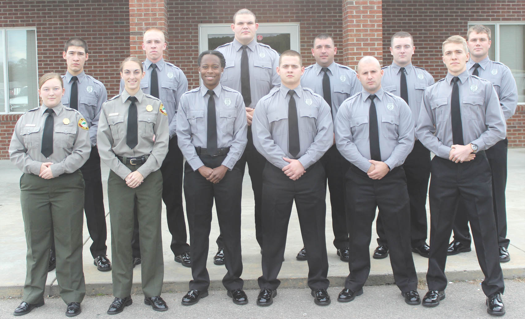 Click to enlarge,  Recent graduates of the Central Carolina Community College Basic Law Enforcement Training program are, left to right: front row, Kassie Amber Moore of Durham, Carla Ann Porterfield of Carrboro, Carol Meritt Lewis of Raleigh, Mitchell Thomas Coggins of Sanford, Jonathan Kyle Dorman of Sanford, and Charles Holden Broyhill of Raleigh; back row, Nicholas Brian Robbins of Holly Springs, Devin Dwight Layne of Sanford, William David Cockman of Siler City, Justin Ryan McLeod of Coats, Stephen Thomas Diggs of Fuquay-Varina, and Nathan Bradley Snyder of Sanford. For more information on the Central Carolina Community College Basic Law Enforcement Training program, contact Robert Powell at rpowell@cccc.edu or call 919-777-7774, or visit the college website at www.cccc.edu/blet. 