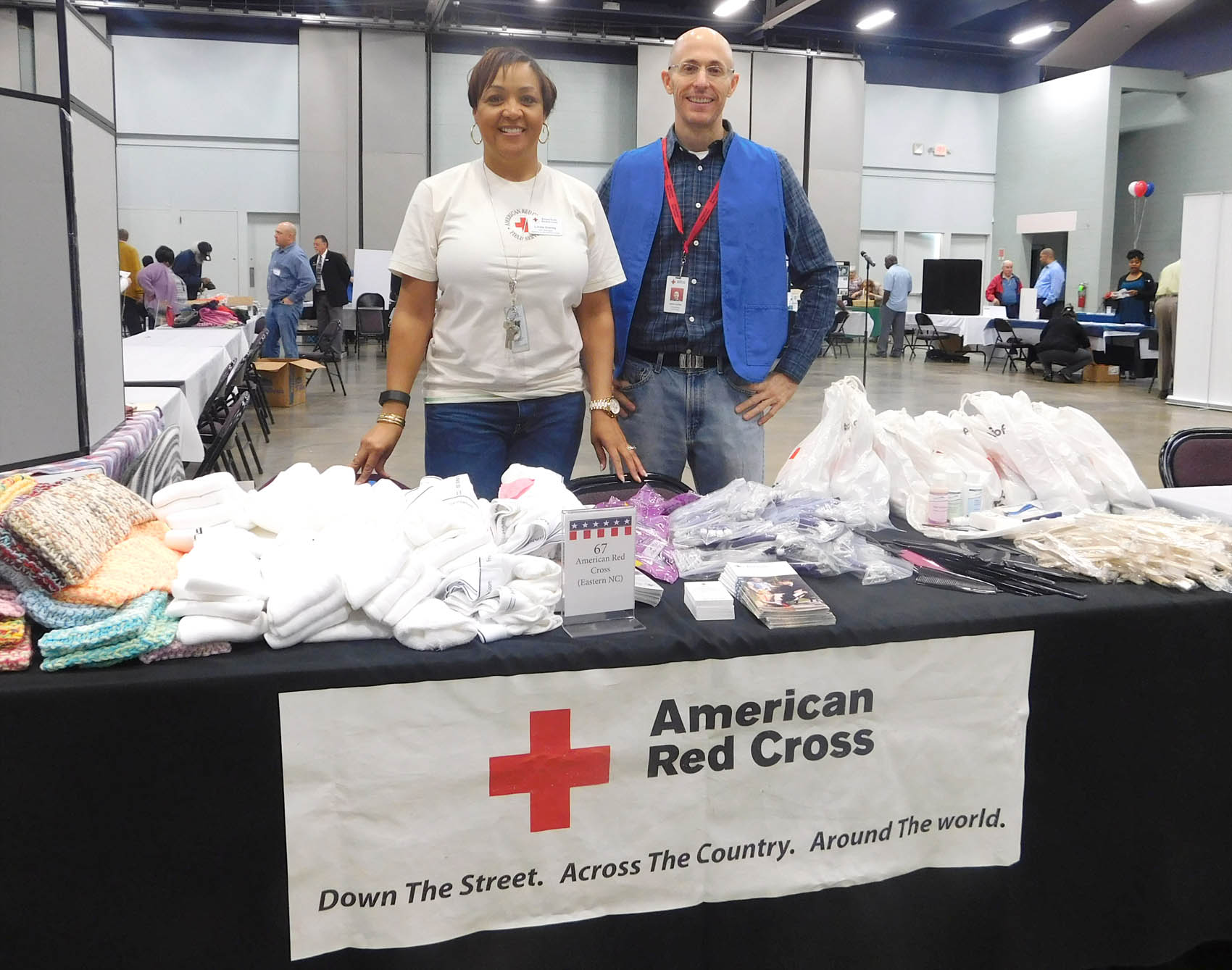 Click to enlarge,  Linda Daney (left) and Galen Collier represented the American Red Cross at the Veterans Resources Fair and Standout on Wednesday, Dec. 30, at the Dennis A. Wicker Civic Center in Sanford. 