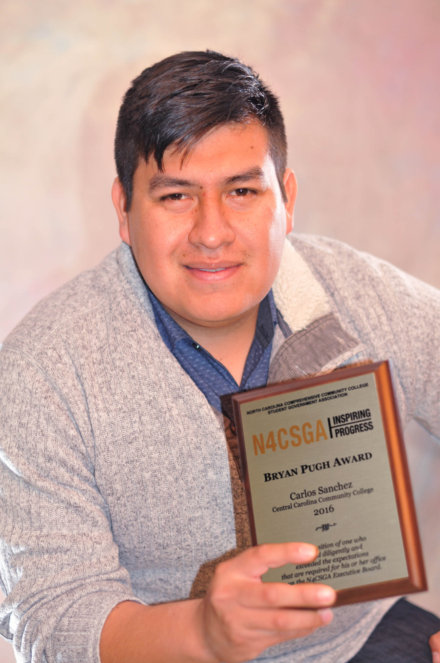 Click to enlarge,  Central Carolina Community College Student Government Association President Carlos Sanchez-Mendez of Siler City recently received the Bryan Pugh Award during the spring conference of the North Carolina Comprehensive Community College Student Government Association (N4CSGA).  