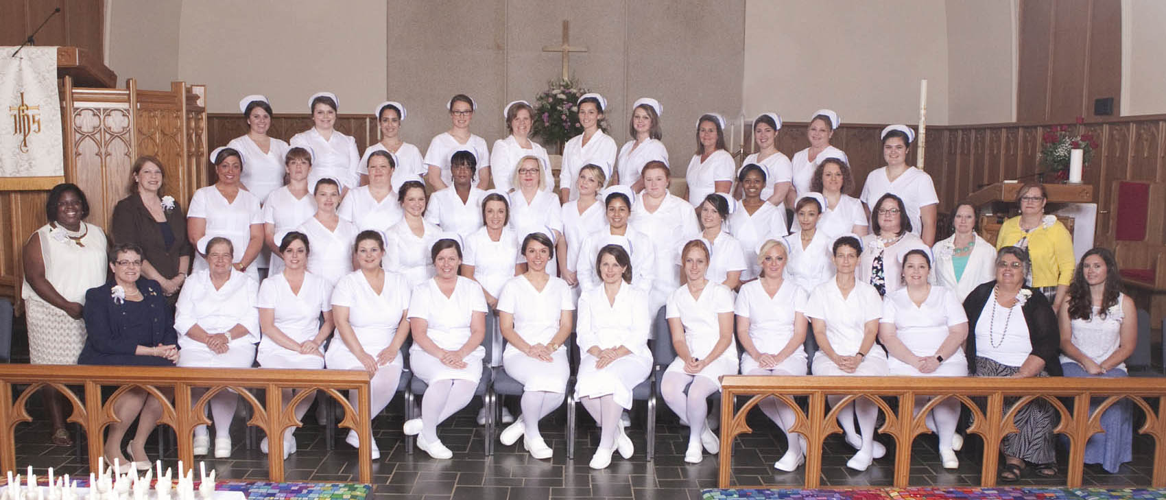 Click to enlarge,  Central Carolina Community College held a Pinning and Candlelighting Ceremony for its 2016 Associate Degree Nursing graduates on Thursday, May 12, at St. Luke United Methodist Church. 