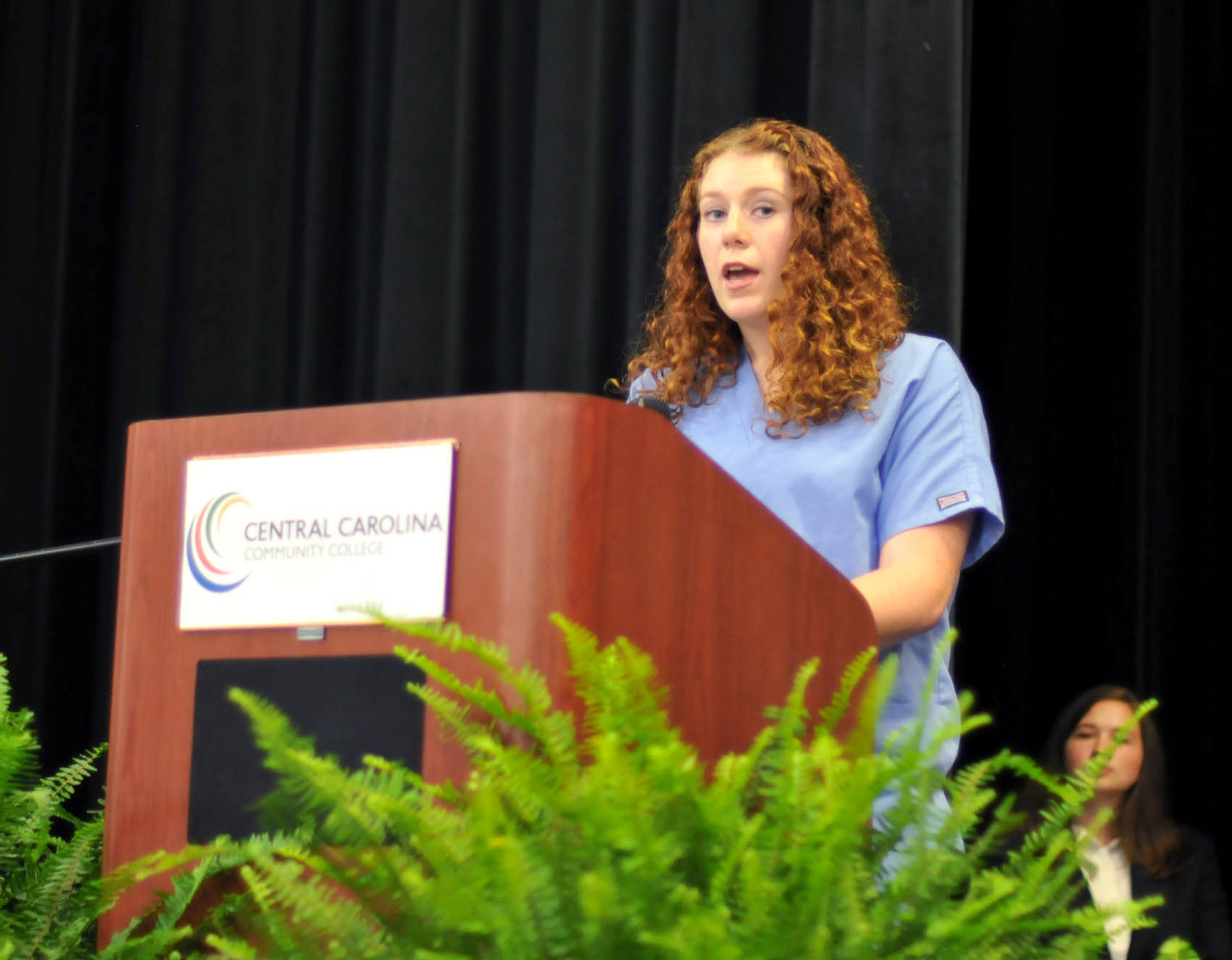 Click to enlarge,  Briana Peterman, of Lee County, was one of four student speakers at the Central Carolina Community College Continuing Education medical programs graduation. The event was held May 26 at the Dennis A. Wicker Civic Center in Sanford. For more information about Continuing Education medical programs, call Lennie Stephenson, CCCC's Director of Continuing Education medical programs, at 910-814-8833 or email lstephenson@cccc.edu. 