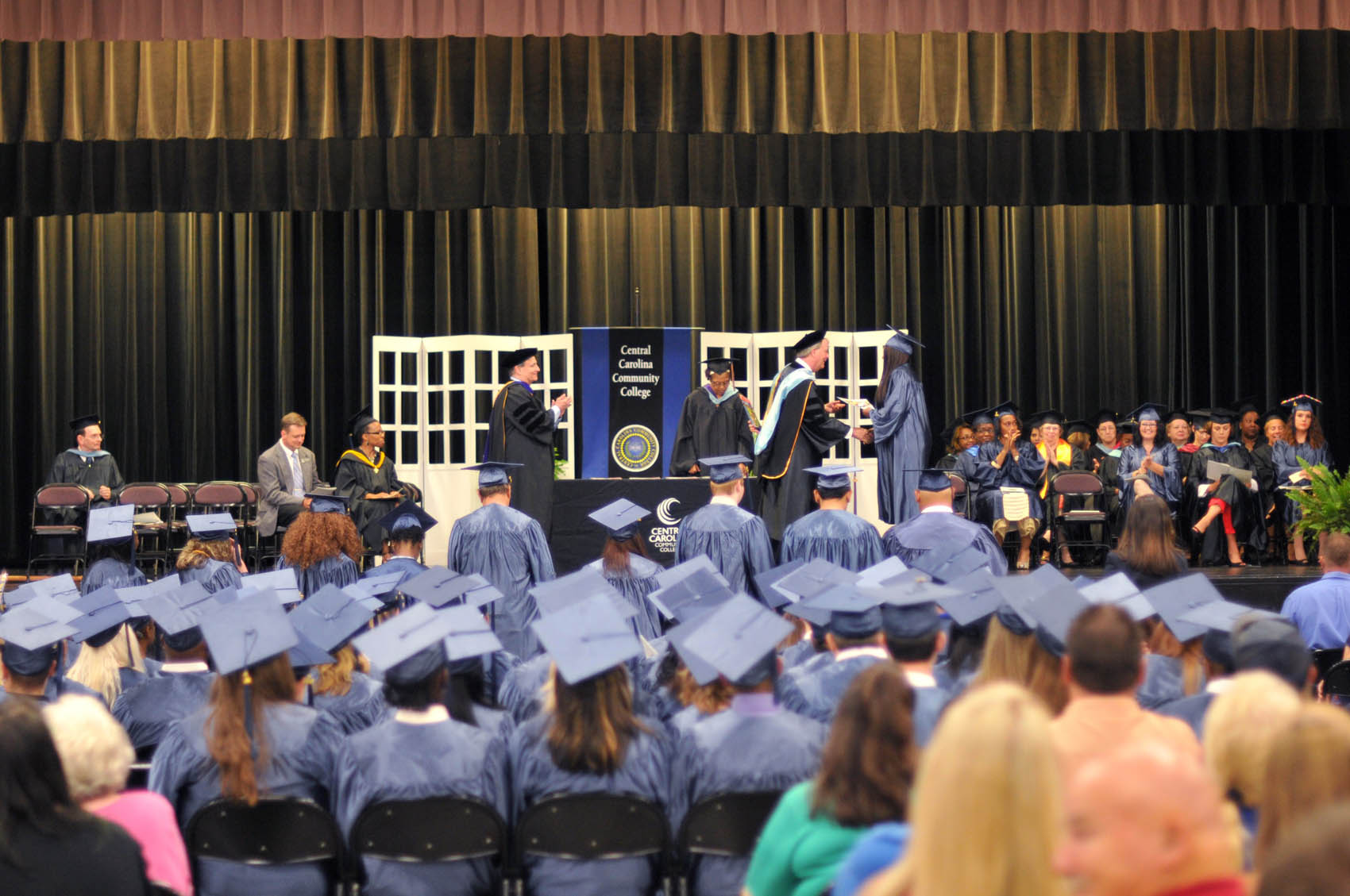 Click to enlarge,  Central Carolina Community College's College and Career Readiness Commencement Exercises was a huge celebration. The June 16 event at the Dennis A. Wicker Civic Center honored the achievements of more than 100 students. 