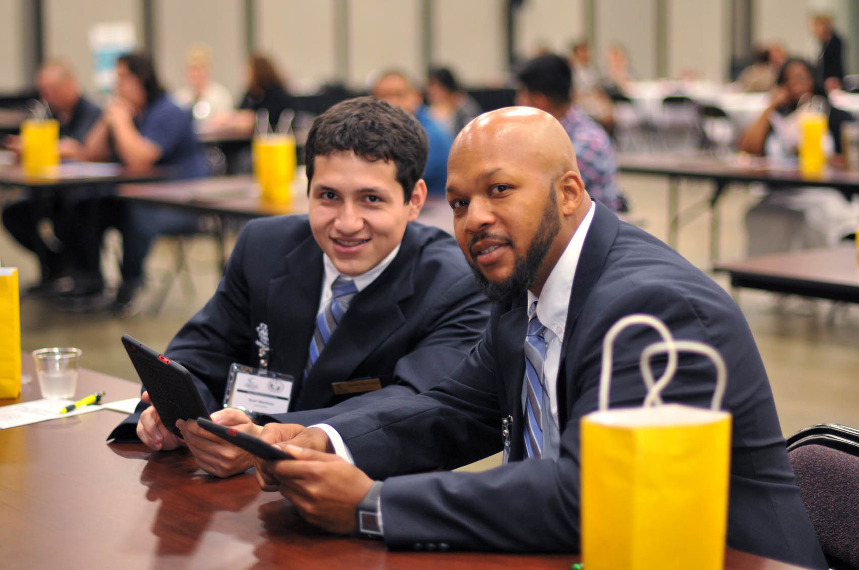 Click to enlarge,  Central Carolina Community College students Noel Martinez and Rasheed Jones participate in the FutureWork Prosperity Tour 2016 program held Wednesday, June 22, at the Dennis A. Wicker Civic Center in Sanford. 