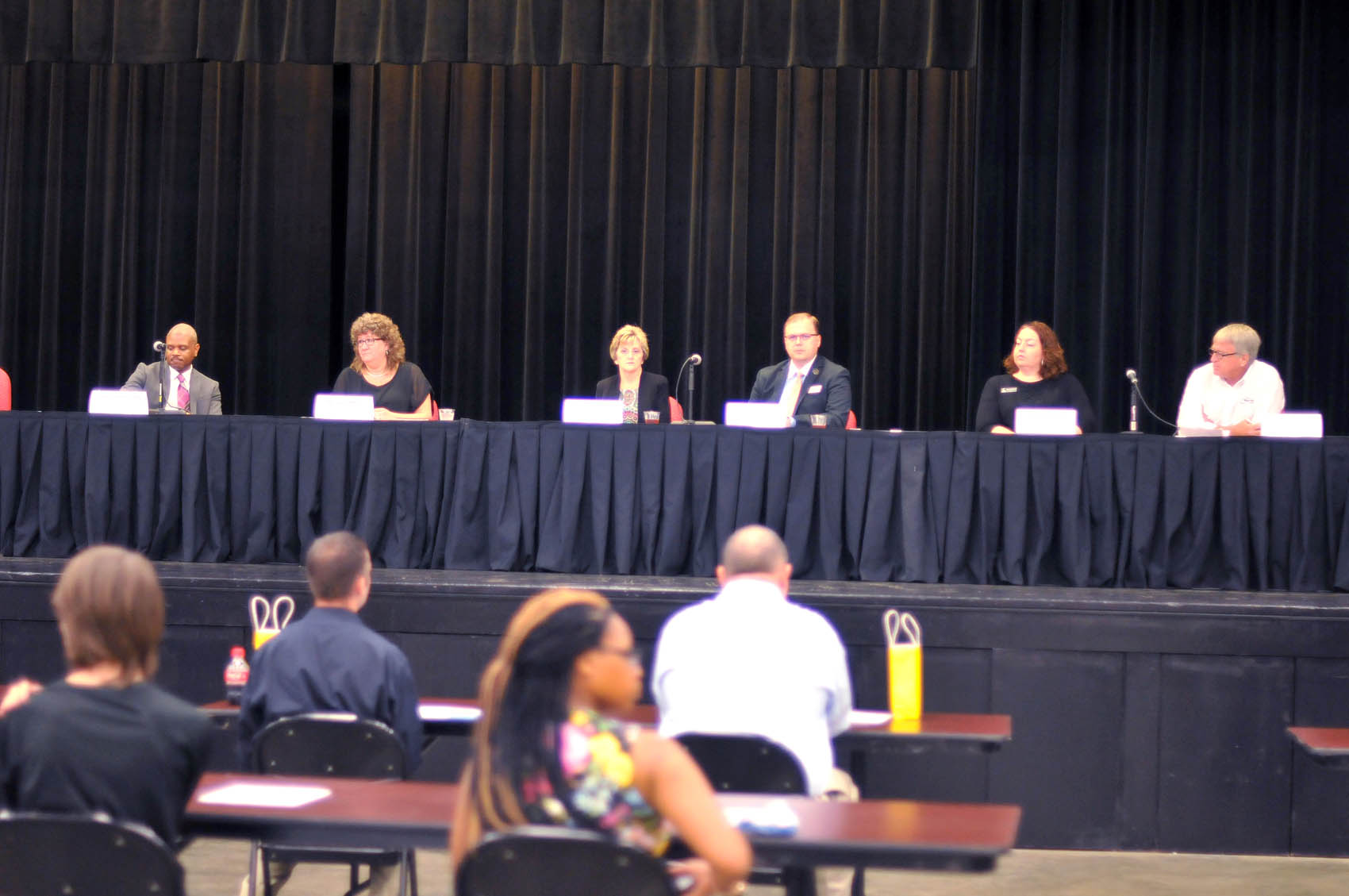 Click to enlarge,  Participants in a FutureWork Prosperity Tour 2016 panel discussion on Wednesday, June 22, included (left to right) Donnie Charleston, Economy Policy Manager, Institute for Emerging Issues; Amy Dalrymple, Chair, Lee County Board of Commissioners; Joyce D. McGehee, Human Resources Director, Lee County; Daniel Simmons, Chief Professional Officer, Boys &amp; Girls Club of Sanford/Lee County; Denise Martin, Program Director, CCCC Health Information Technology; and Jerry Pedley, President and Owner, Mertek Solutions Inc. 