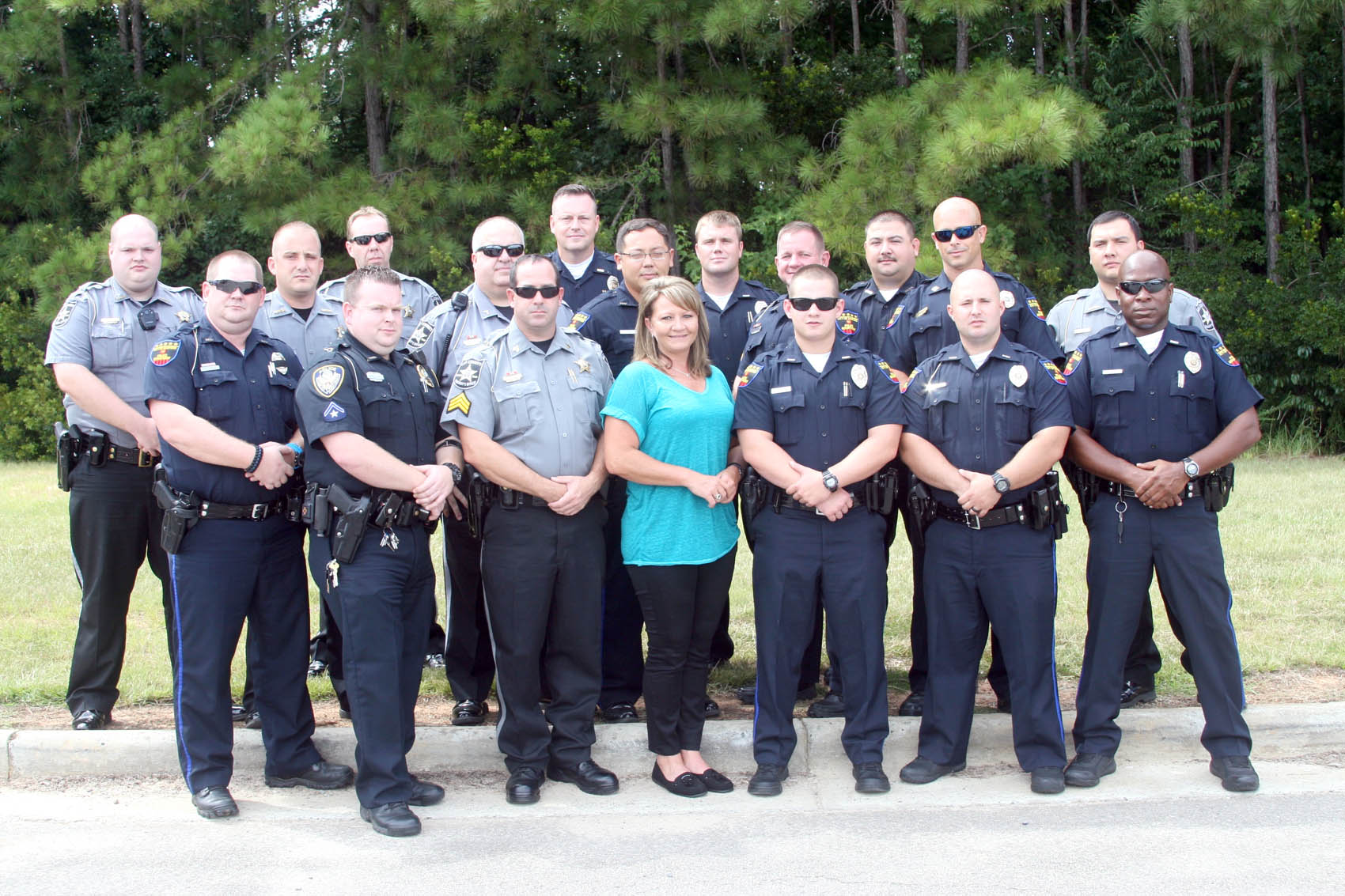 Click to enlarge,  Recent graduates of the Lee County Crisis Intervention Team training program were, left to right: front row, William Gardner, Anthony Norton, Kenneth Gilstrap, Audrey Baker, Mitchell Coggins, Johnathan Dorman and William Heck; back; row, Zachary Petty, Jerod Kirk, Mitchell Ashley, William Malan, Kenneth Hair, Kenneth Ott, Nathan Snyder, Billy Rodgers, William Kidd, James Young and Charles Jordan. Not pictured is Tyler Bridges. 