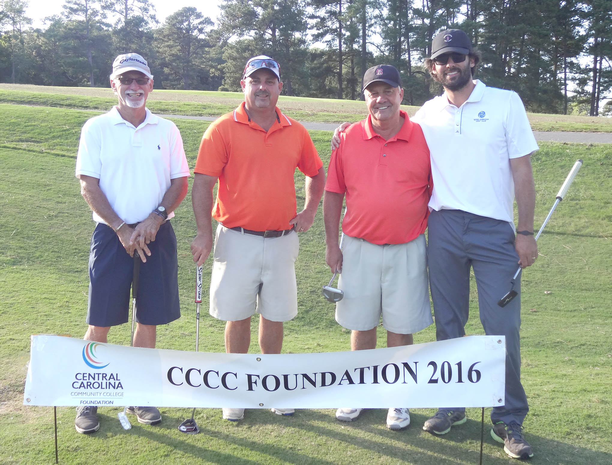 Click to enlarge,  The team of Curtis Salmon, Buck Womack, Robbie Currin, and Stephen Salmon won the second flight of the afternoon tournament of the CCCC Foundation Lee Golf Classic. 