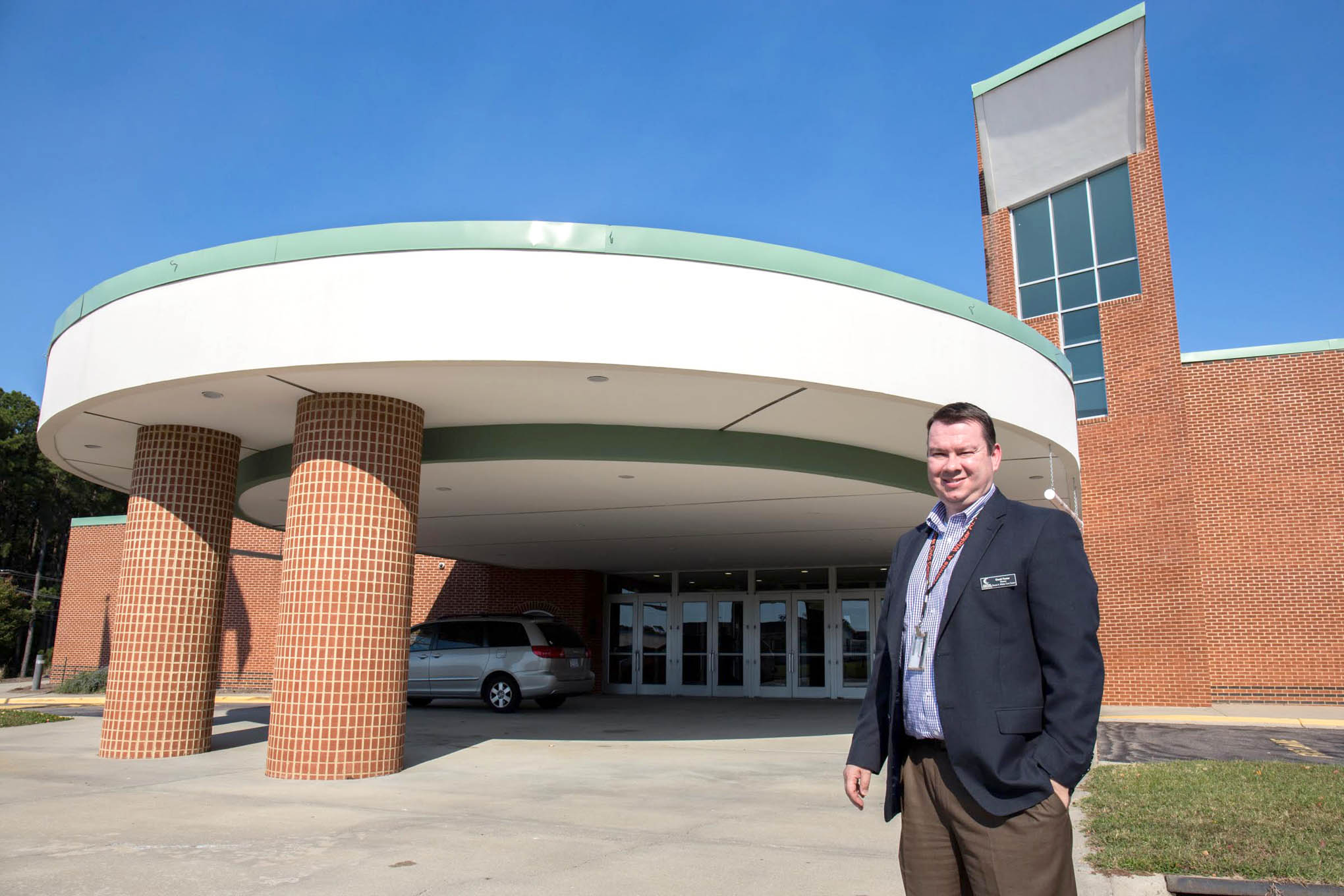 Click to enlarge,  David Foster, director of the Dennis A. Wicker Civic Center, was a student at Lee County Senior High School across the street when the building was being built. Now, he runs operations for the center, which hosts just under 1,000 events a year. 