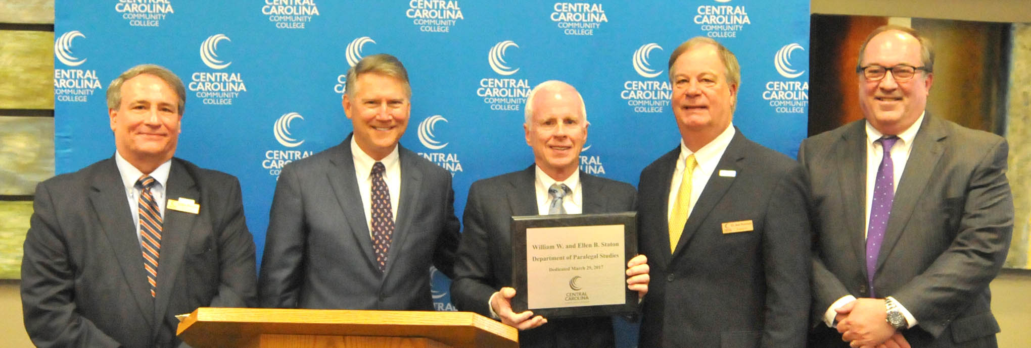 Click to enlarge,  Central Carolina Community College's Department of Paralegal Studies has been dedicated in honor of the late William W. and Ellen B. Staton of Sanford. Pictured at the dedication ceremony were CCCC Board of Trustees Chairman Julian Philpott; former N.C. Lt. Gov. Dennis Wicker; Wayne Staton, son of William W. and Ellen B. Staton; CCCC President Dr. T. Eston Marchant; and CCCC Trustee Norman "Chip" Post Jr. 
