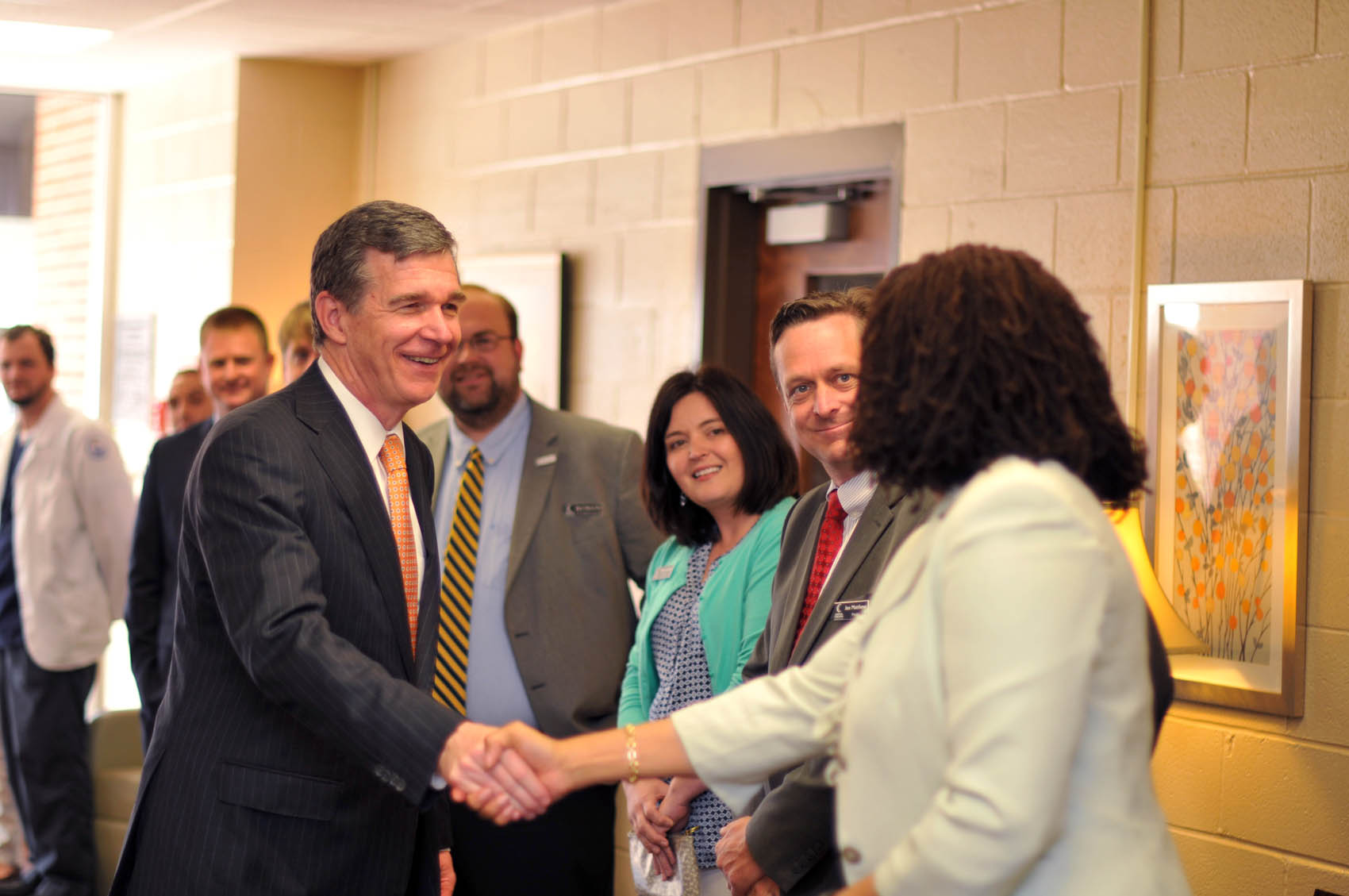 Click to enlarge,  North Carolina Gov. Roy Cooper visits with Central Carolina Community College faculty, staff, and students on Wednesday, April 12, at the CCCC Lee Main Campus. 