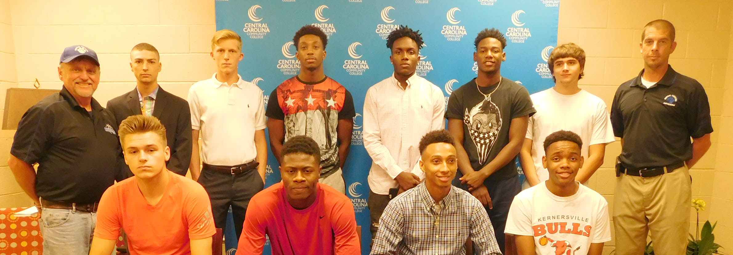 Click to enlarge,  Eleven student-athletes have signed to join the Central Carolina Community College men's basketball program for the 2017-2018 season. Pictured are, left to right: front row, Caleb Thomas, Jeremiah Tolbert, Michael Brown, and Daniel Matangira; back row, CCCC Head Coach Doug Connor, Tyler Toro, Trey North, Chris George, Toby Brown Jr., Montel Moore, Cameron Wilson, and CCCC Assistant Coach Brad McDougald. Not pictured is Chrishawn Lindsey. 