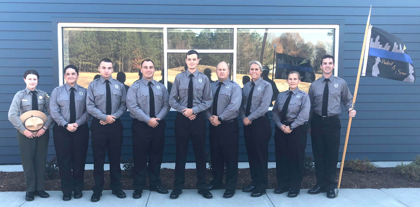 Click to enlarge,  Pictured are members of Central Carolina Community College's Basic Law Enforcement Training (BLET) Fall 2017 graduating class. Pictured are, left to right: Lindsey Purvis, Johnsie Holbrook, Ryan Jollie, Cody Roberts, Kyle Moore, Ian Scott, Olivia Sturdivant, Jayne Holland, and Maximillian Hogan. For more information about the college's BLET program, visit www.cccc.edu/blet or contact Robert Powell at rpowell@cccc.edu or 919-777-7774. 