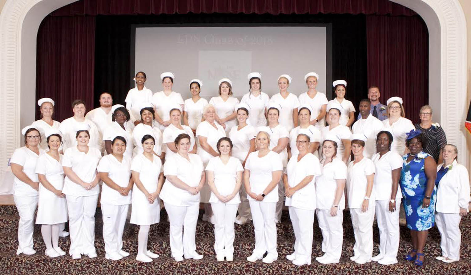 Click to enlarge,  The Central Carolina Community College Louise L. Tuller School of Nursing Practical Nursing program held a Pinning and Candle Lighting Ceremony for the Class of 2018 on Monday, July 23, at Campbell University's Turner Auditorium. 