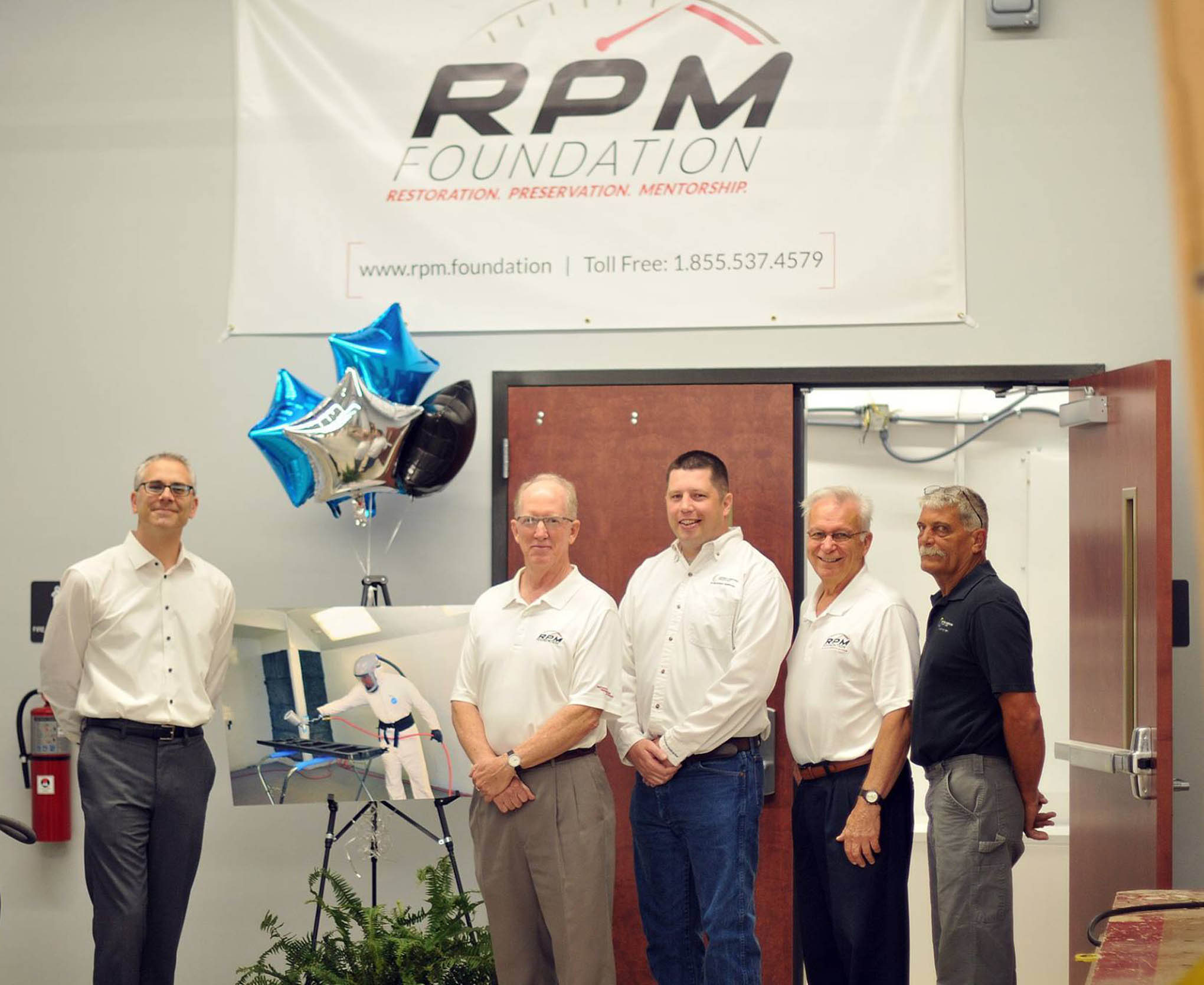 Click to enlarge,  RPM Foundation officials attended the Central Carolina Community College ribbon cutting to celebrate the opening of the West Harnett Center Automotive Restoration Facility on Thursday, Aug. 9. 