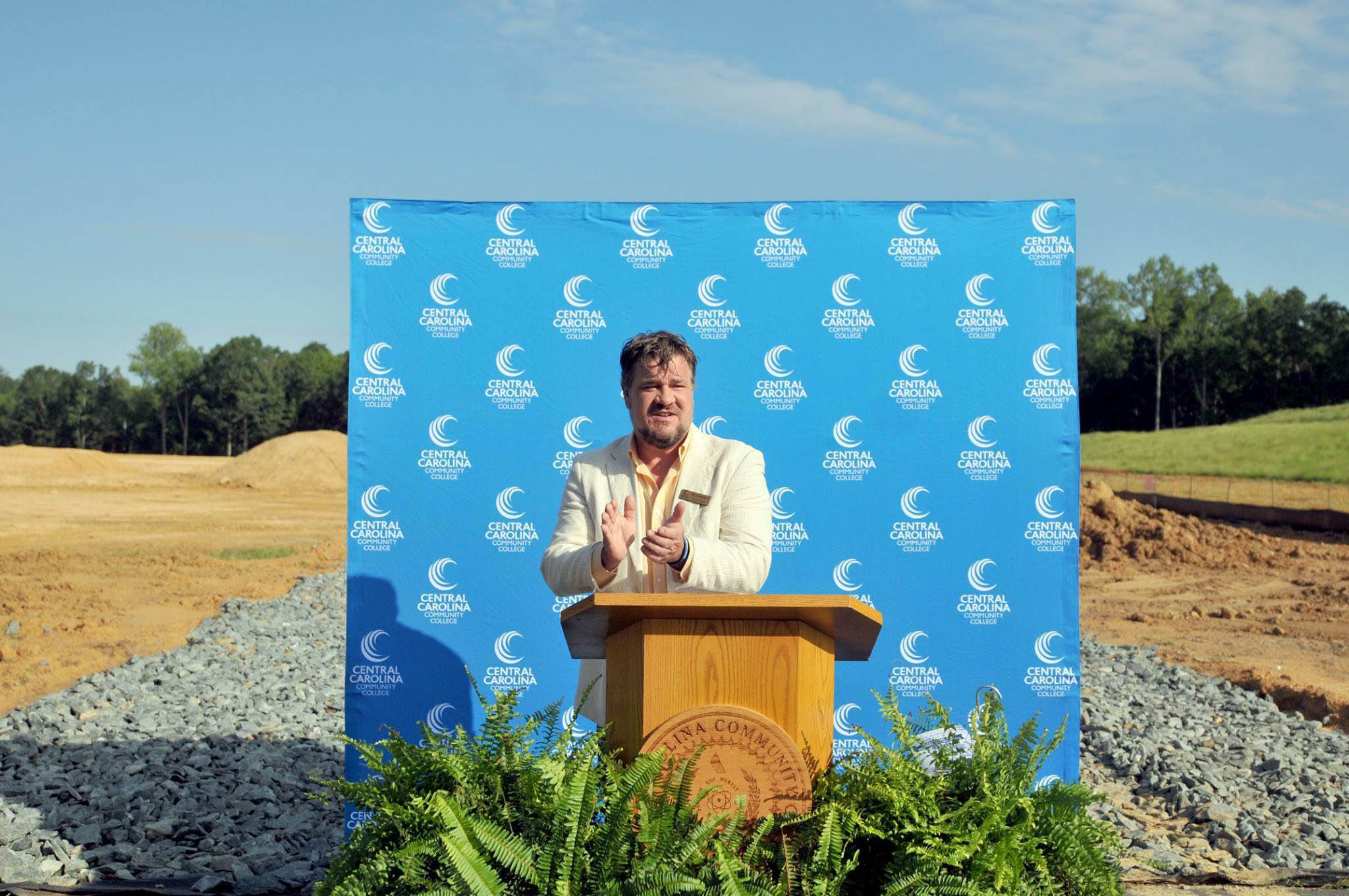 Click to enlarge,  Jim Crawford, member of the Chatham County Board of Commissioners and the CCCC Board of Trustees, spoke to attendees at the college's groundbreaking ceremony on Aug. 22 for the new Chatham Health Sciences Center. 
