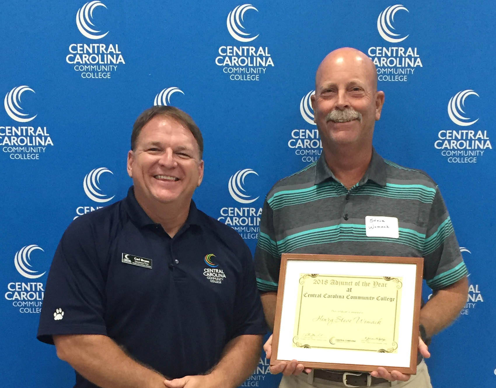 Click to enlarge,  Henry Steve Womack (right) has been named Central Carolina Community College Adjunct of the Year. He is pictured with Carl Bryan, CCCC Health &amp; Fitness Science Program Director. Womack currently teaches in the Health &amp; Fitness Science curriculum, providing instruction in prevention and care of athletic injuries. He has provided CCCC with his expertise in athletic training and instruction for the past two years by teaching a class in which students receive both their American Heart Association and Red Cross CPR and First Aid credentials. Not only are they receiving credit for the class, but the students also are receiving four credentials to place on their resumes. For more information on Central Carolina Community College and its programs, visit www.cccc.edu. 
