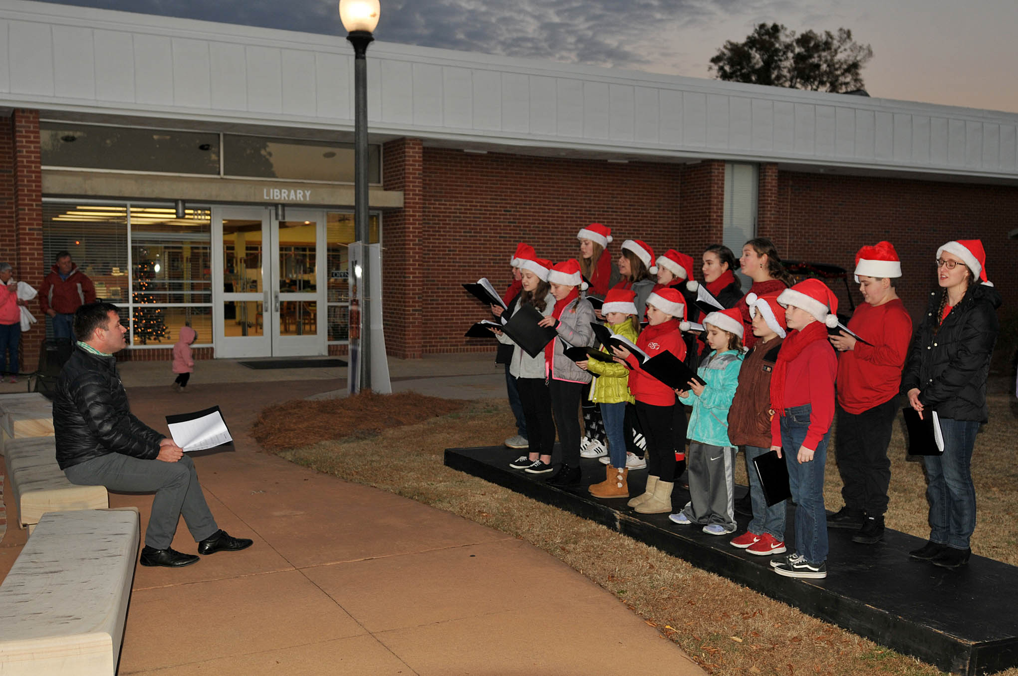 Click to enlarge,  The Temple Teens participated in the Central Carolina Community College Foundation Christmas Tree Lighting celebration. 