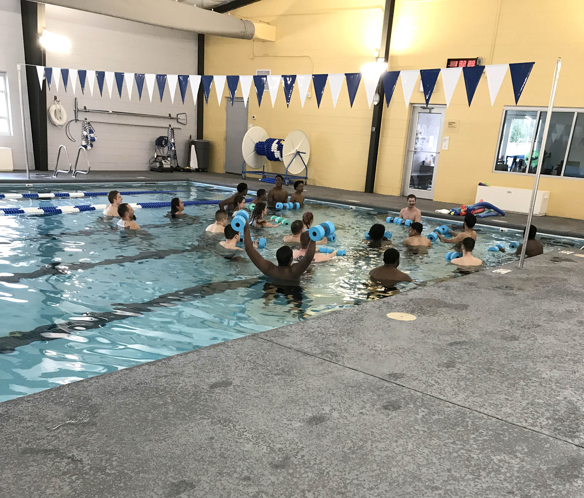 Click to enlarge,  Central Carolina Community College Health and Fitness Science students participate in water aerobics at Sanford's Ingram Family YMCA. 