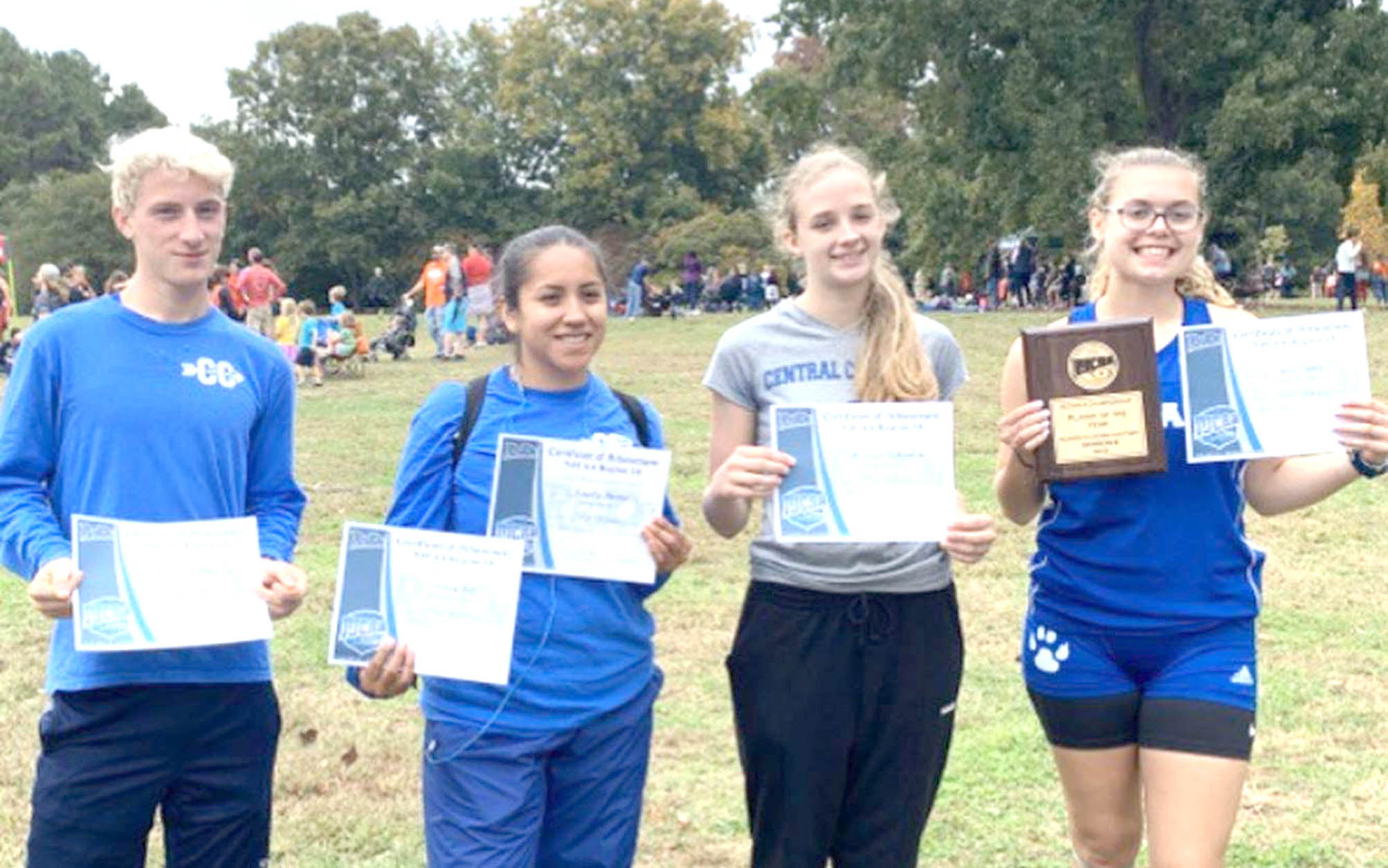 Click to enlarge,  The Central Carolina Community College cross country team recently competed at the National Junior College Athletic Association (NJCAA) Region X Cross Country Championships in Spartanburg, S.C. In the women's competition, Anna Trotter (far right) of Pittsboro, N.C., won first place for Division 3 and was named Runner of the Year. Nayelly Martinez (second from left) of Sanford, N.C., finished third and Marilynn Richardson (second from right) of Sanford, N.C., finished fourth among Division 3 runners. All three were named to the All-Region team. In the men's competition, Colby Day (far left) of Frisco, N.C., led the Cougars, finishing fourth among Division 3 runners. He was also named to the All-Region team. The men's team placed second overall in Division 3. Trotter and Day will advance to the NJCAA Division 3 Men's and Women's Cross Country Championships on Saturday at Stanley Park in Westfield, Mass. 