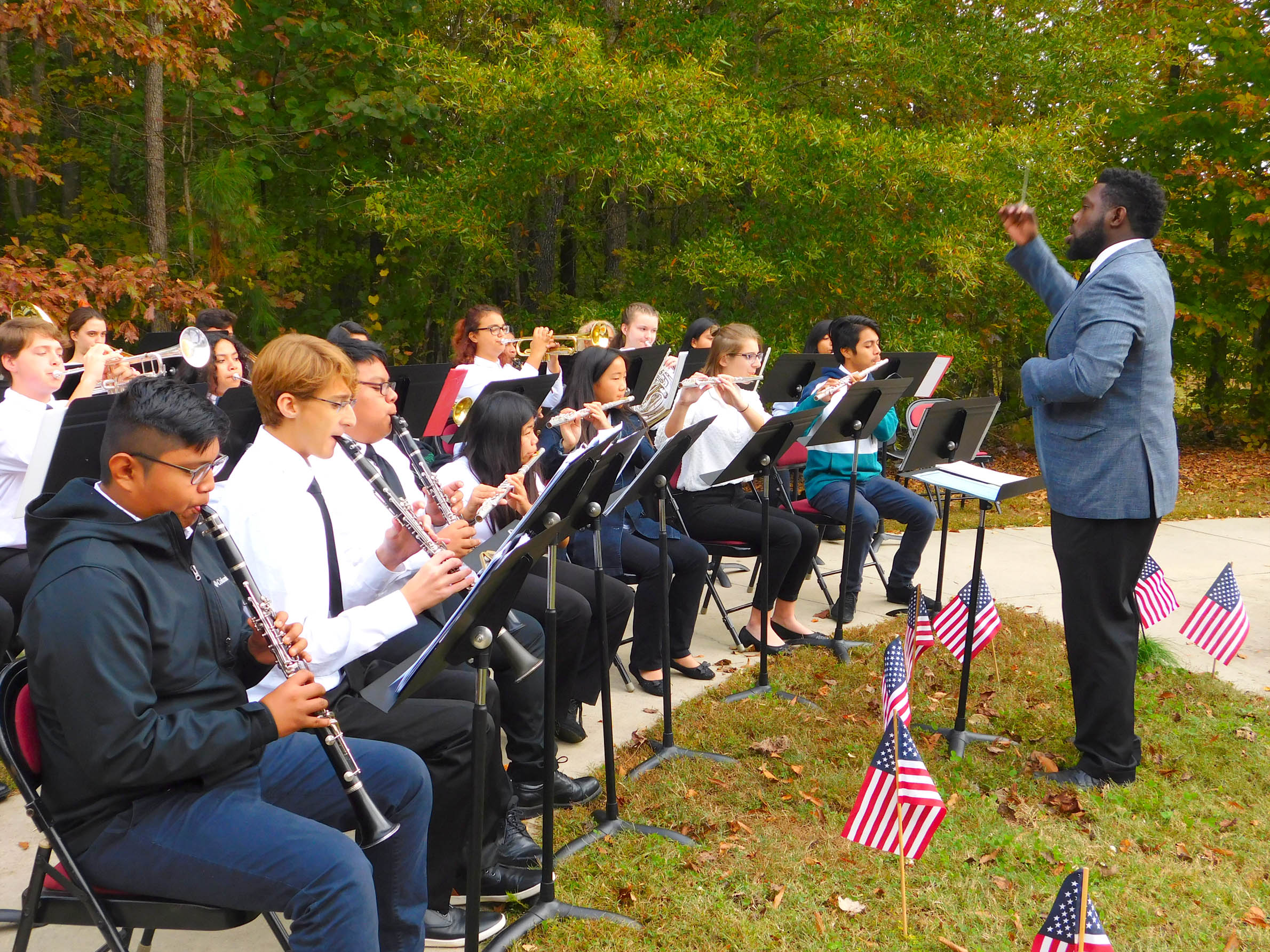Click to enlarge,  The Jordan-Matthews High School Band, under the direction of Justin Harper, provided music for the Veterans Day program held Nov. 5 at the Central Carolina Community College Siler City Center. 
