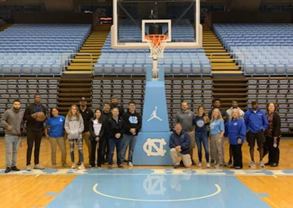 Click to enlarge,  John Bruner, Associate Athletic Director for Event Management at UNC-Chapel Hill, recently provided game day overview for both the Dean E. Smith Student Activity Center and Kenan Stadium for the second-year Central Carolina Community College Health &amp; Fitness Science students enrolled in Facility Management. Students were provided an overview of all the moving parts of moving in over 22,000 people for a basketball game and over 55,000 people for a football game. Students were able to spend some time in Koury Natatorium to get an overview of a swimming facility, as well as peruse the Carolina Basketball Museum. Students were also given an overview of the ACC Network's presence on each of the ACC campuses. Bruner teaches a similar course in the Sports Administration Graduate Program at UNC-Chapel Hill. For more information on the CCCC Health and Fitness Science program, contact Program Director Dr. Carl Bryan at 919-718-7554 or by email at cbryan@cccc.edu.  
