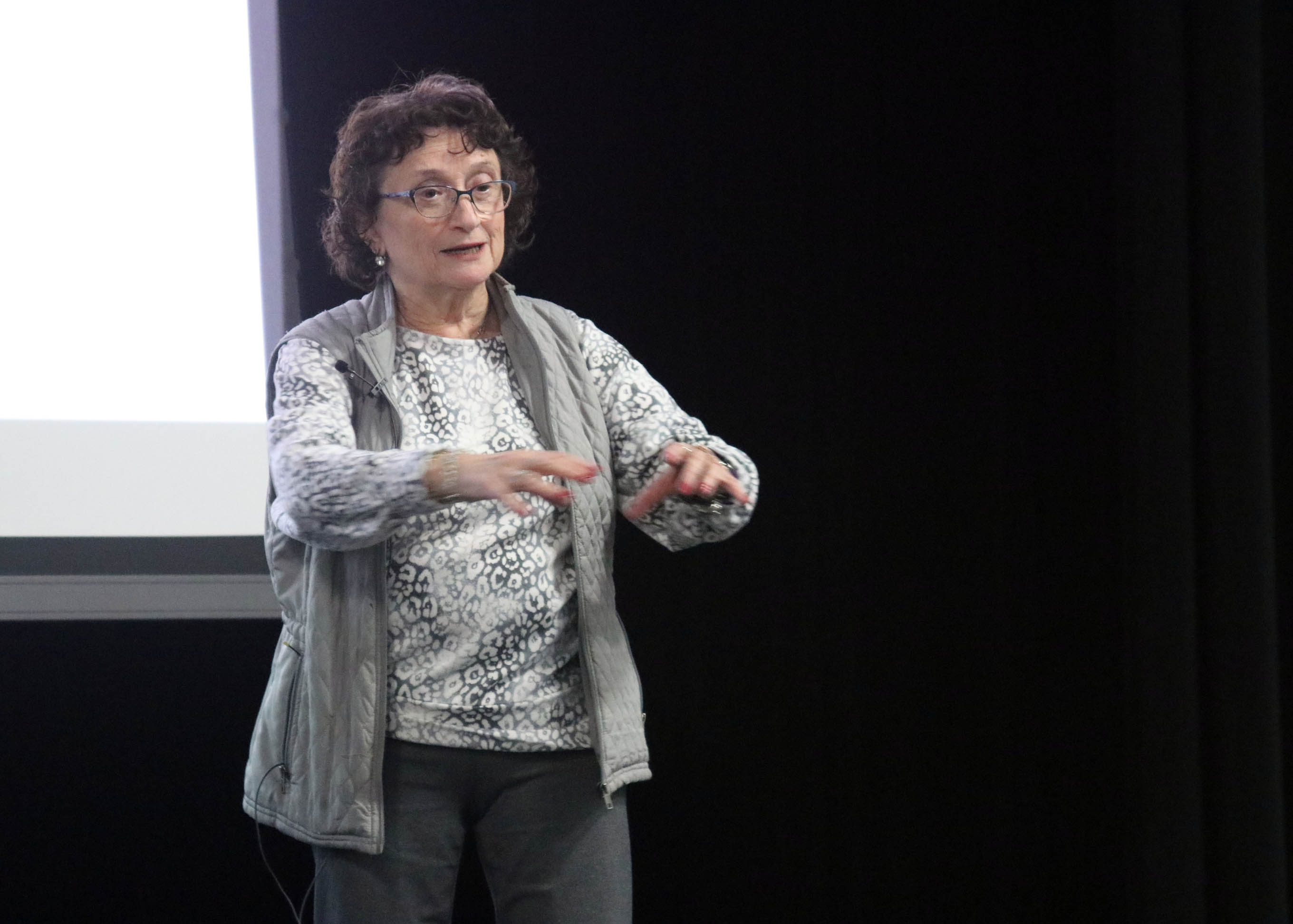 Click to enlarge,  Judy Stevens speaks about her mother, who survived the notorious Auschwitz-Birkenau concentration camp, during Central Carolina Community College's sixth-annual Holocaust Remembrance held on Feb. 28 at the Dennis A. Wicker Civic &amp; Conference Center. 