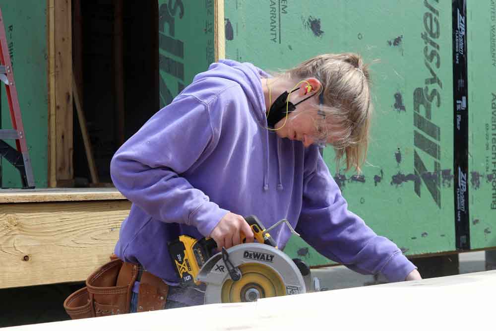 Click to enlarge,  Grace Whittington has excelled as a student in the Central Carolina Community College Women in Construction class, as she now has her own business - Springwater Construction LLC. 