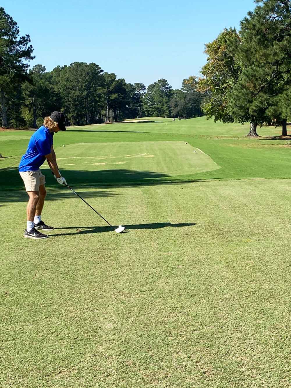 Click to enlarge,  Henry Sapienza, a graduate of Northwood High School, participates as a member of the Central Carolina Community College golf team during the CCCC Cougar Classic tournament played at the Quail Ridge Golf Club in Sanford. 