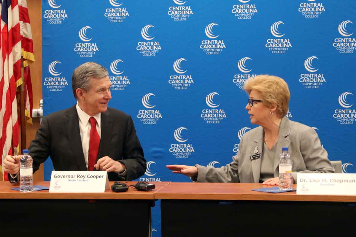 Click to enlarge,  N.C. Gov. Roy Cooper (left) and Central Carolina Community College President Dr. Lisa M. Chapman (right) during Gov. Cooper's visit to CCCC. 