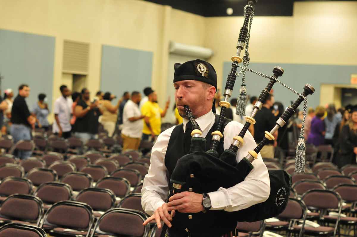 Click to enlarge,  The Central Carolina Community College graduating students entered the main hall to the skirl of a bagpipe, a CCCC tradition. The CCCC 59th Commencement Exercises was held May 16 at the Dennis A. Wicker Civic &amp; Conference Center in Sanford. 