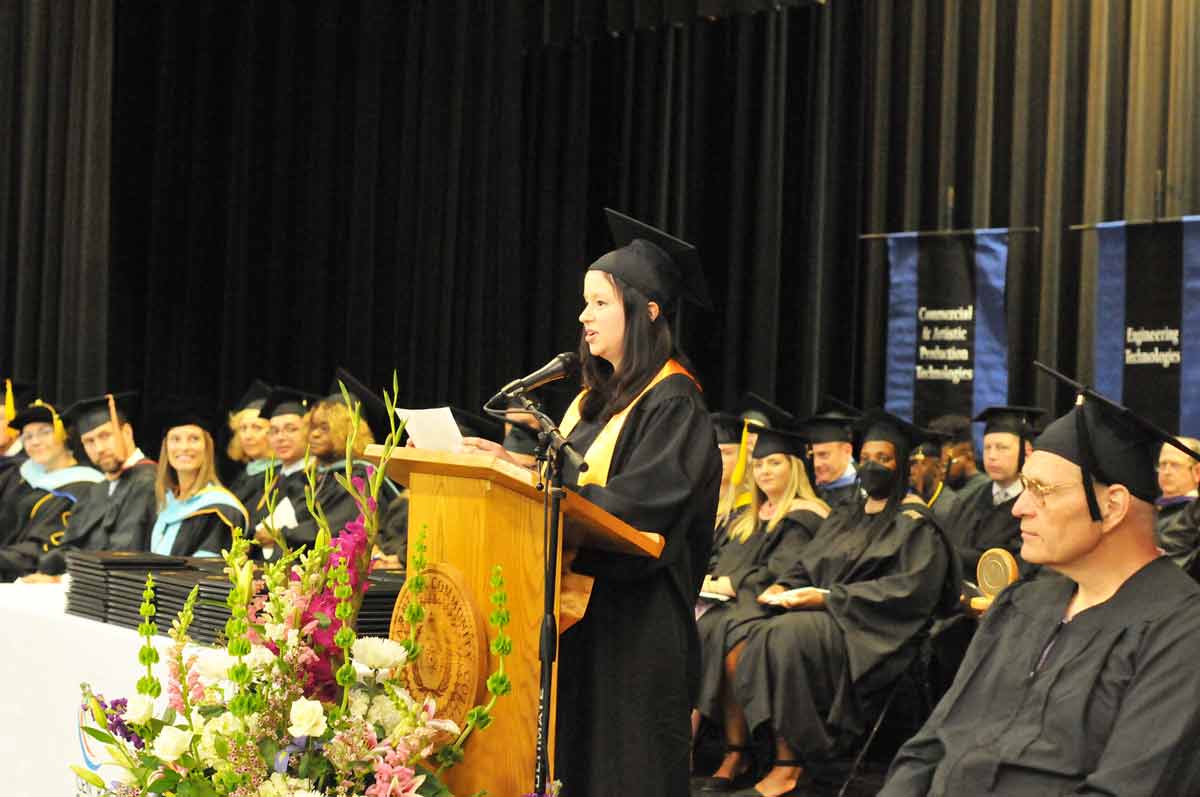 Click to enlarge,  Victoria Isenhour of Sanford spoke to Central Carolina Community College graduates at the 3 p.m. program. The CCCC 59th Commencement Exercises was held May 16 at the Dennis A. Wicker Civic &amp; Conference Center in Sanford. 