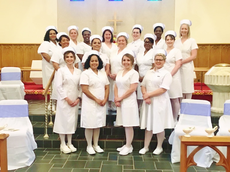 Click to enlarge,  Members of the Central Carolina Community College Louise L. Tuller School of Nursing Associate Degree Nursing Class of 2022 are pictured, left to right: first row, Robyn Bernier, Marta Gonzales, Amber Skinner, and Danielle Adkins; second row, Brittney Hart, Casandra Colon, Katelyn Taylor, DeNeane Hunter, and Aarika Ginn; third row, Gabrielle Clay, Abigail Segura, Cicely Harrison, Brittany Moore, Ammy Scott, Ebunoluwa Gabriel, and Elizabeth Cosimo; not pictured, Laura Rivera. 
