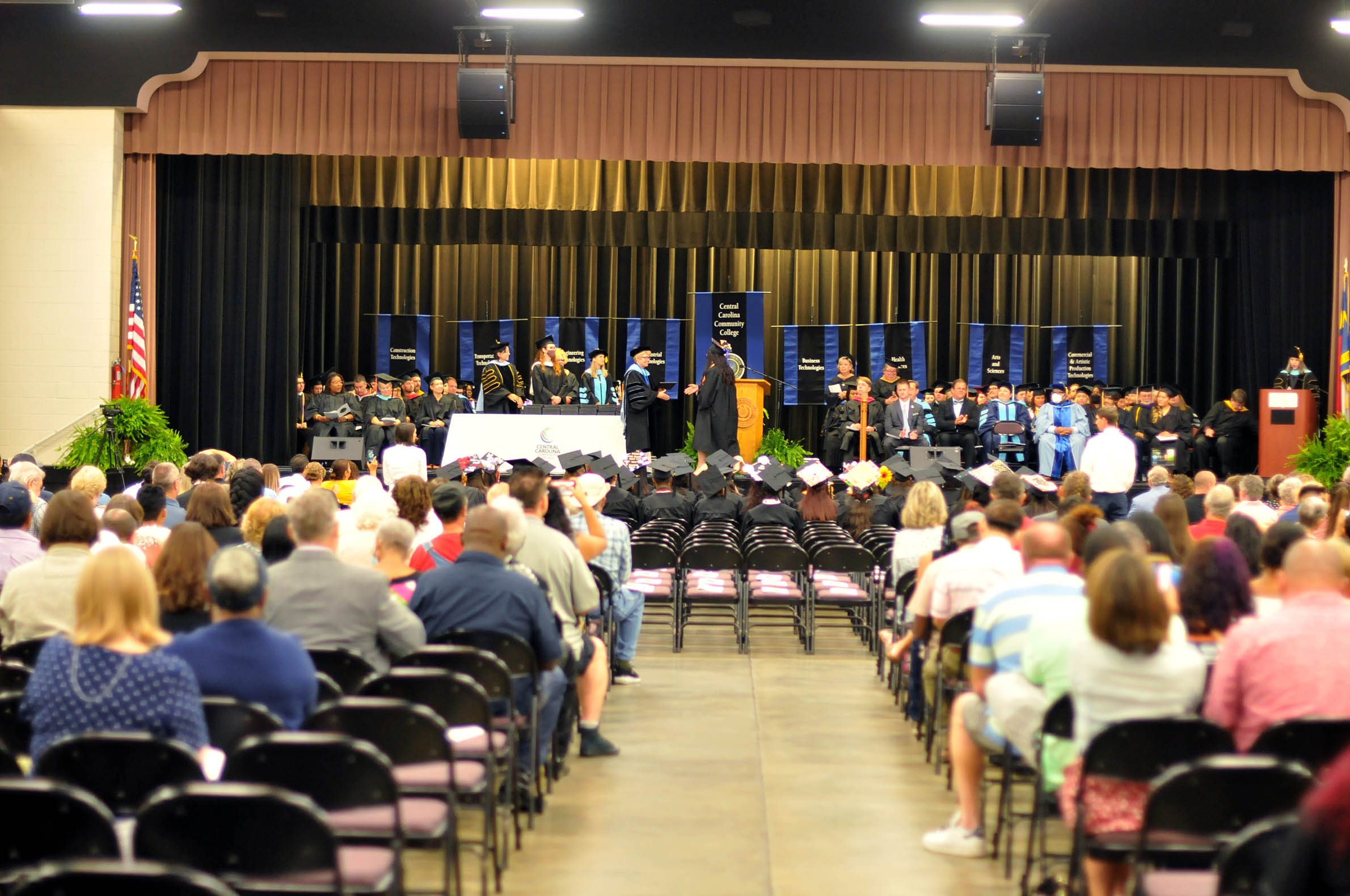 Click to enlarge,  Central Carolina Community College celebrated the achievements of the Class of 2022 as the school observed its 60th Commencement Exercises on Aug. 9 at the Dennis A. Wicker Civic &amp; Conference Center in Sanford. 