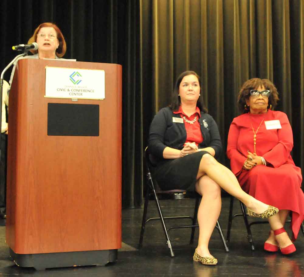 Click to enlarge,  Lynda Turbeville, Central Carolina Community College Foundation Board Chair, provided welcoming remarks for the Central Carolina Community College Foundation Scholarship Luncheon on Wednesday, Nov. 16, at the Dennis A. Wicker Civic &amp; Conference Center. At right are Dr. Emily C. Hare, CCCC Foundation Executive Director, and Margaret Murchison, WWGP Radio News Director and CCCC Foundation Board Member. 
