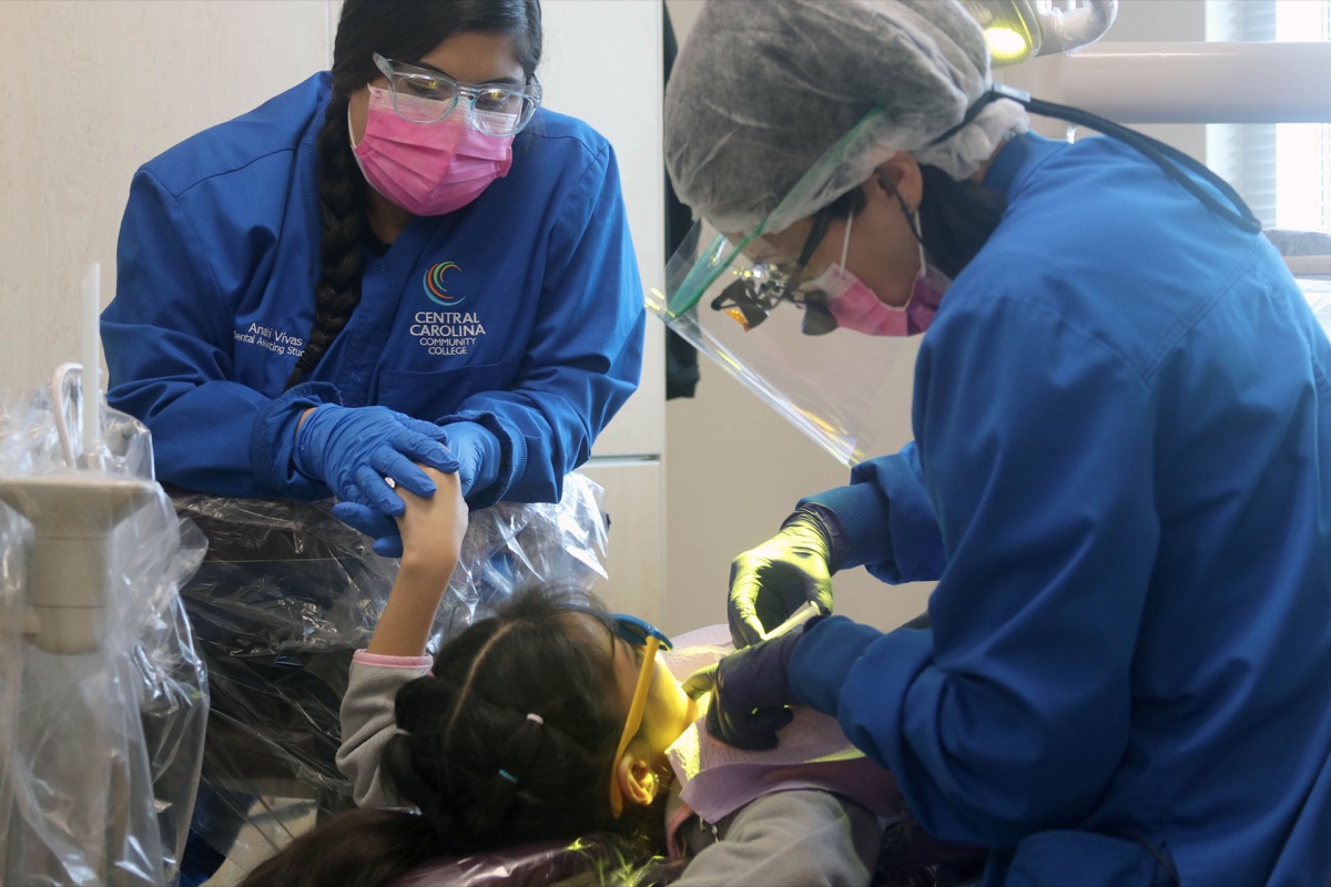 Click to enlarge,  Free dental services were provided at the Central Carolina Community College Give Kids A Smile event. 