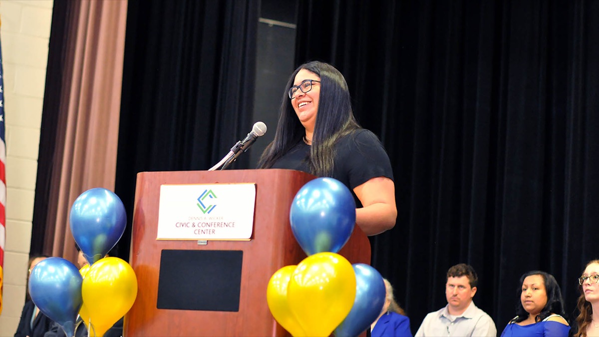 Click to enlarge,  Karmisha Hernandez Luciano, Veterans Upward Bound Assistant Programs Director (Interim) and PTK alumnus, was a speaker at the CCCC Beta Sigma Phi Chapter of Phi Theta Kappa International Honor Society induction ceremony. 