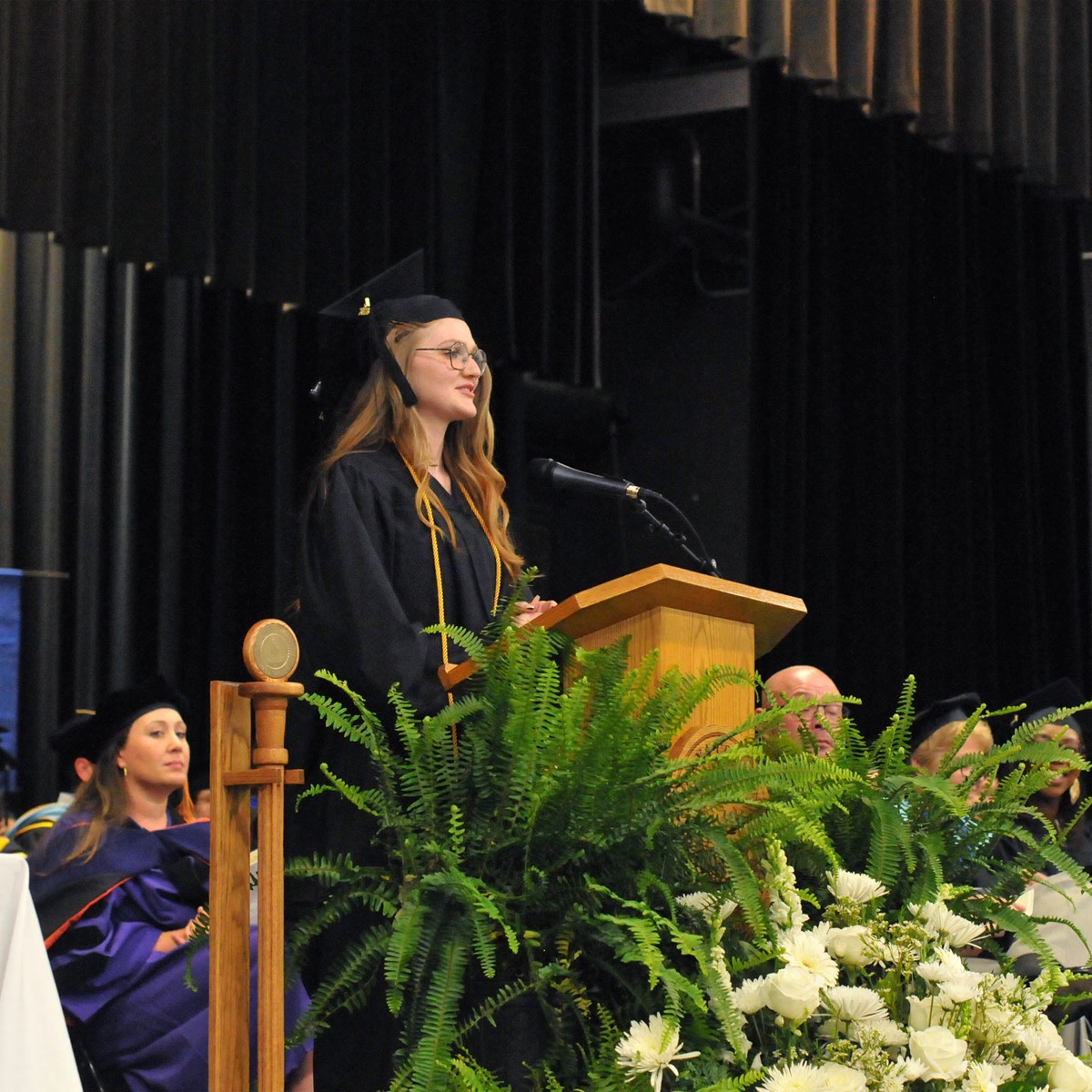 Click to enlarge,  Jessica Webb of Cameron spoke to Central Carolina Community College graduates at the 2 p.m. program. The CCCC 61st Commencement Exercises was held May 11 at the Dennis A. Wicker Civic &amp; Conference Center in Sanford. 
