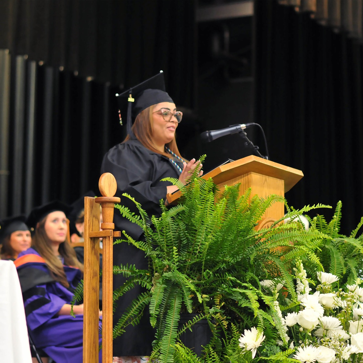 Click to enlarge,  Katiria Delgado Acevedo of Broadway spoke to Central Carolina Community College graduates at the 9 a.m. program. The CCCC 61st Commencement Exercises was held May 11 at the Dennis A. Wicker Civic &amp; Conference Center in Sanford. 