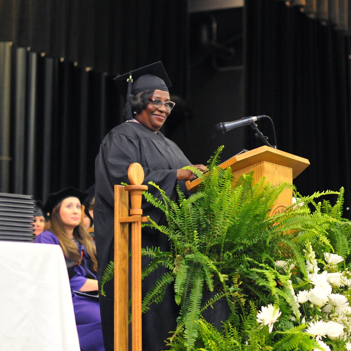 Click to enlarge,  Linda Ellison of Sanford spoke to Central Carolina Community College graduates at the 9 a.m. program. The CCCC 61st Commencement Exercises was held May 11 at the Dennis A. Wicker Civic &amp; Conference Center in Sanford. 
