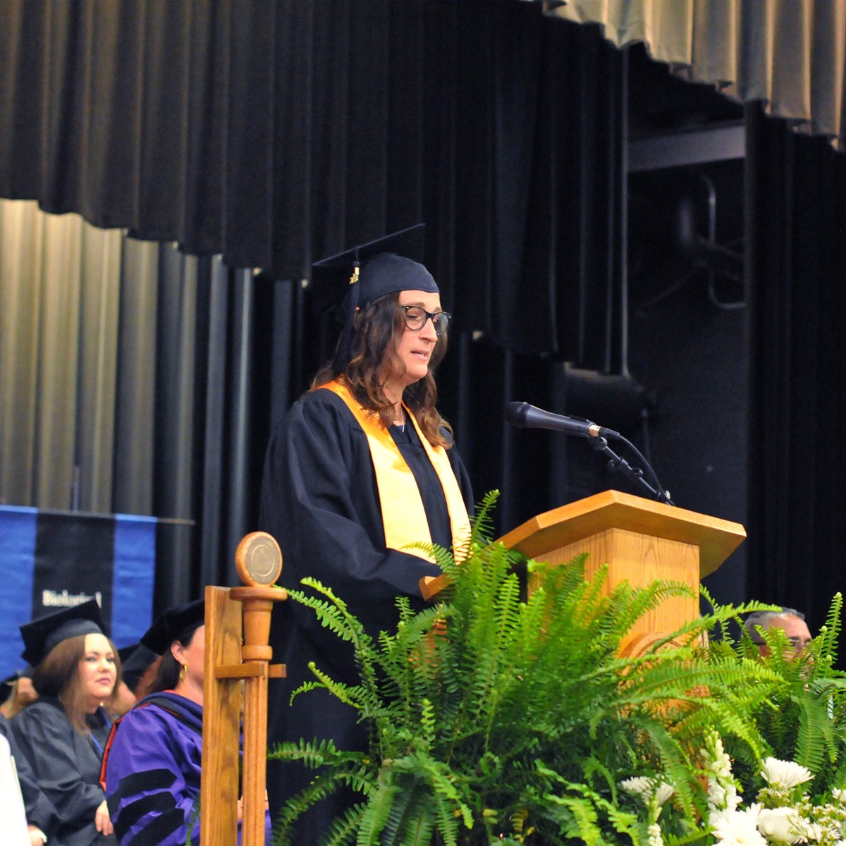 Click to enlarge,  Christine Hart of Sanford spoke to Central Carolina Community College graduates at the 11 a.m. program. The CCCC 61st Commencement Exercises was held May 11 at the Dennis A. Wicker Civic &amp; Conference Center in Sanford. 