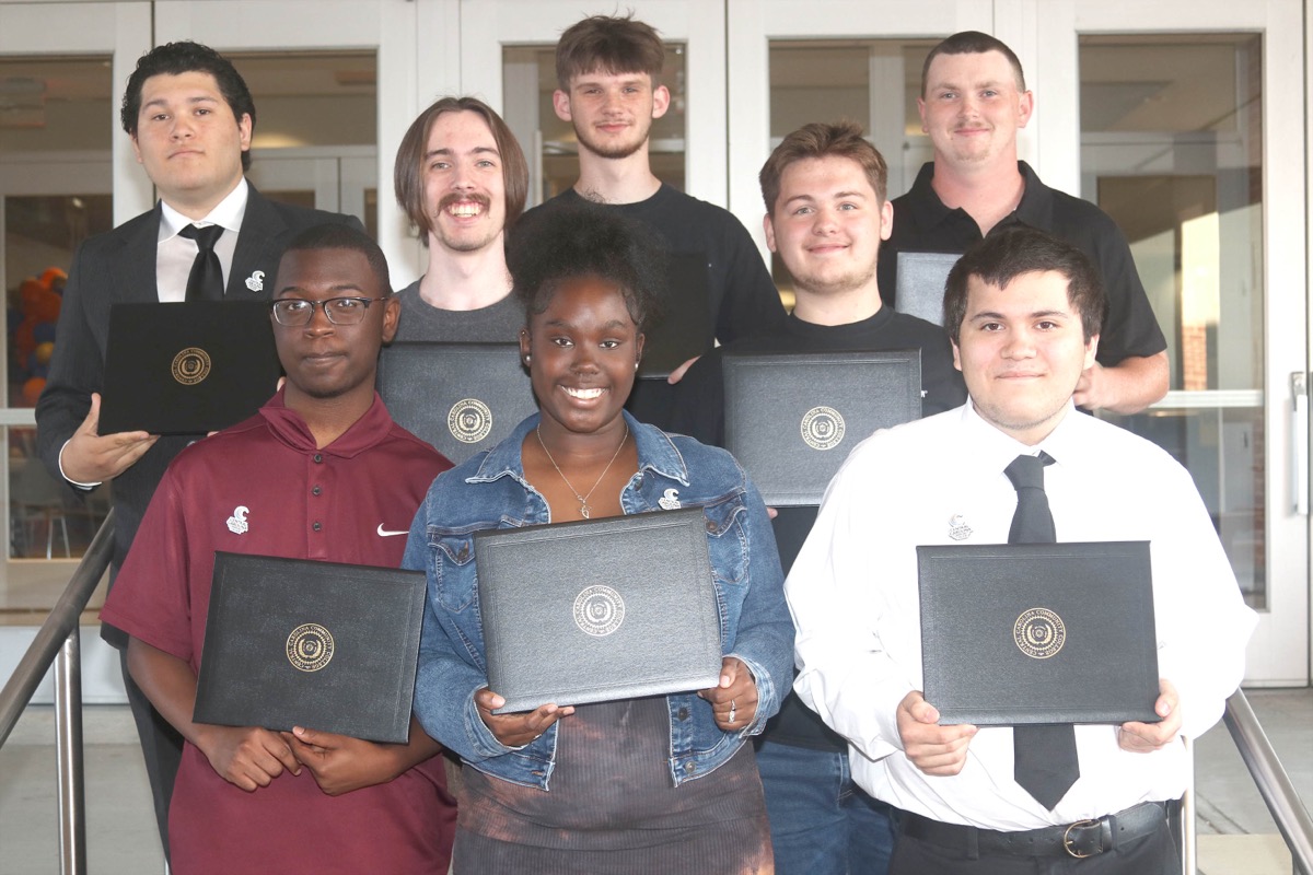 Click to enlarge,  Eight students have successfully completed the two-year Caterpillar Youth Apprenticeship in Welding this spring. 